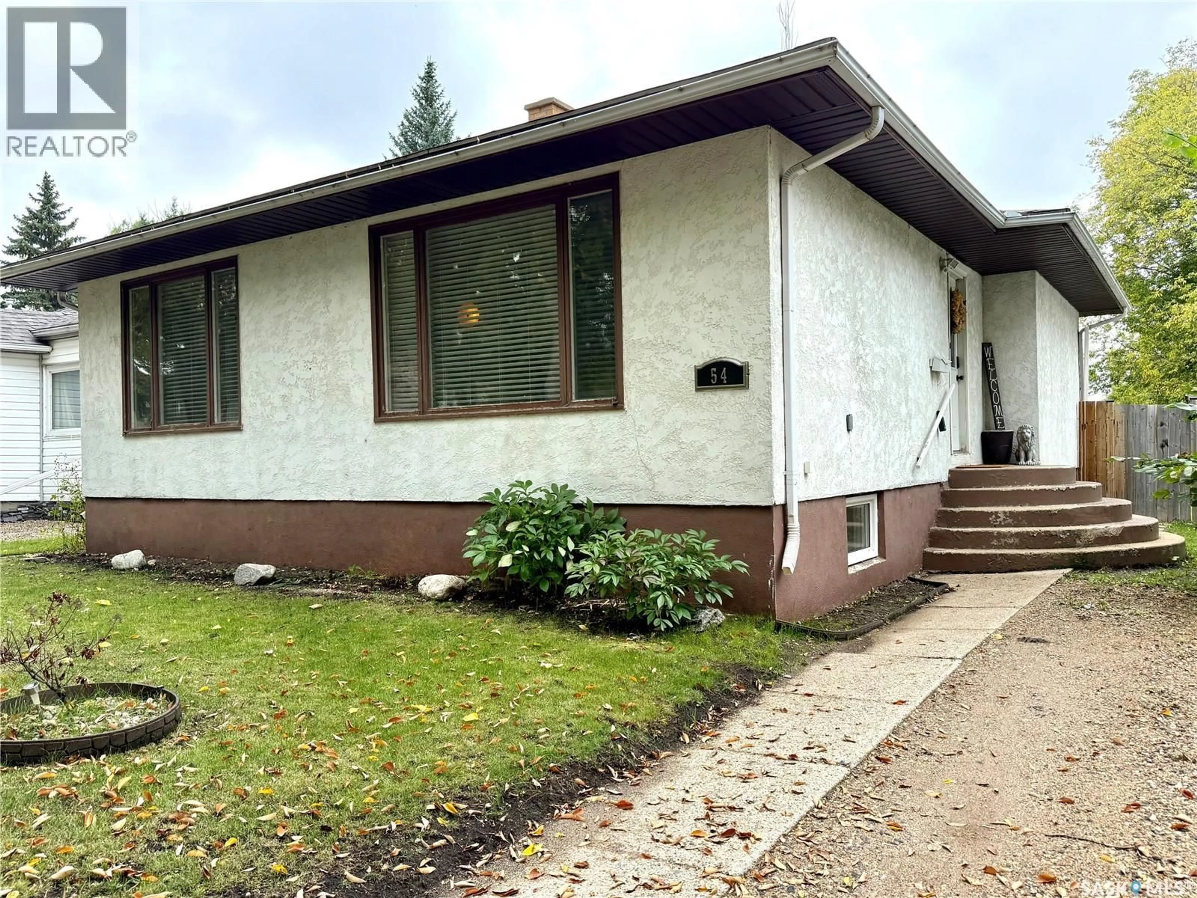 Home with vinyl exterior material, street for 54 ASSINIBOIA AVENUE, Yorkton Saskatchewan S3N1N6