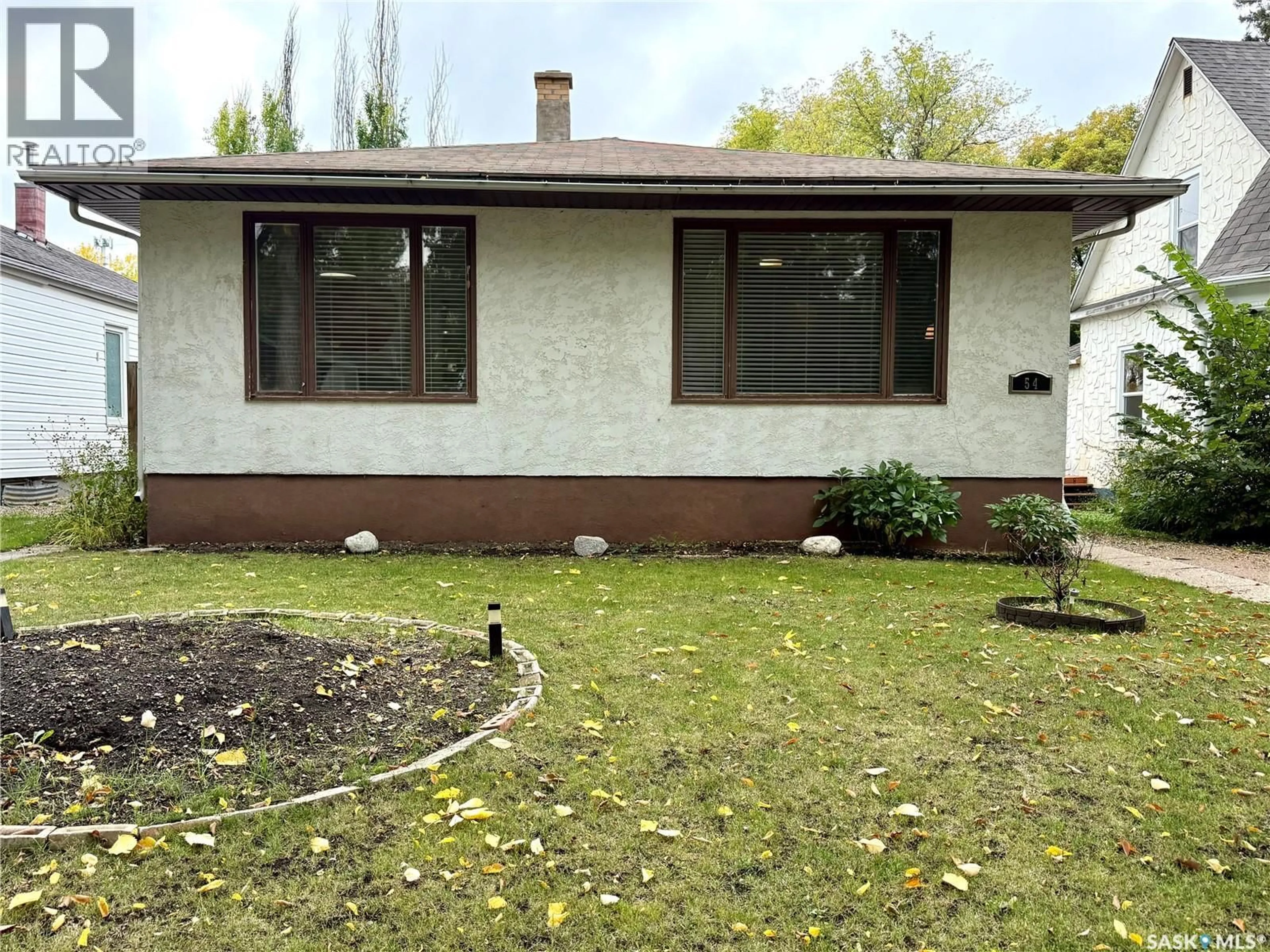 Home with vinyl exterior material, street for 54 ASSINIBOIA AVENUE, Yorkton Saskatchewan S3N1N6