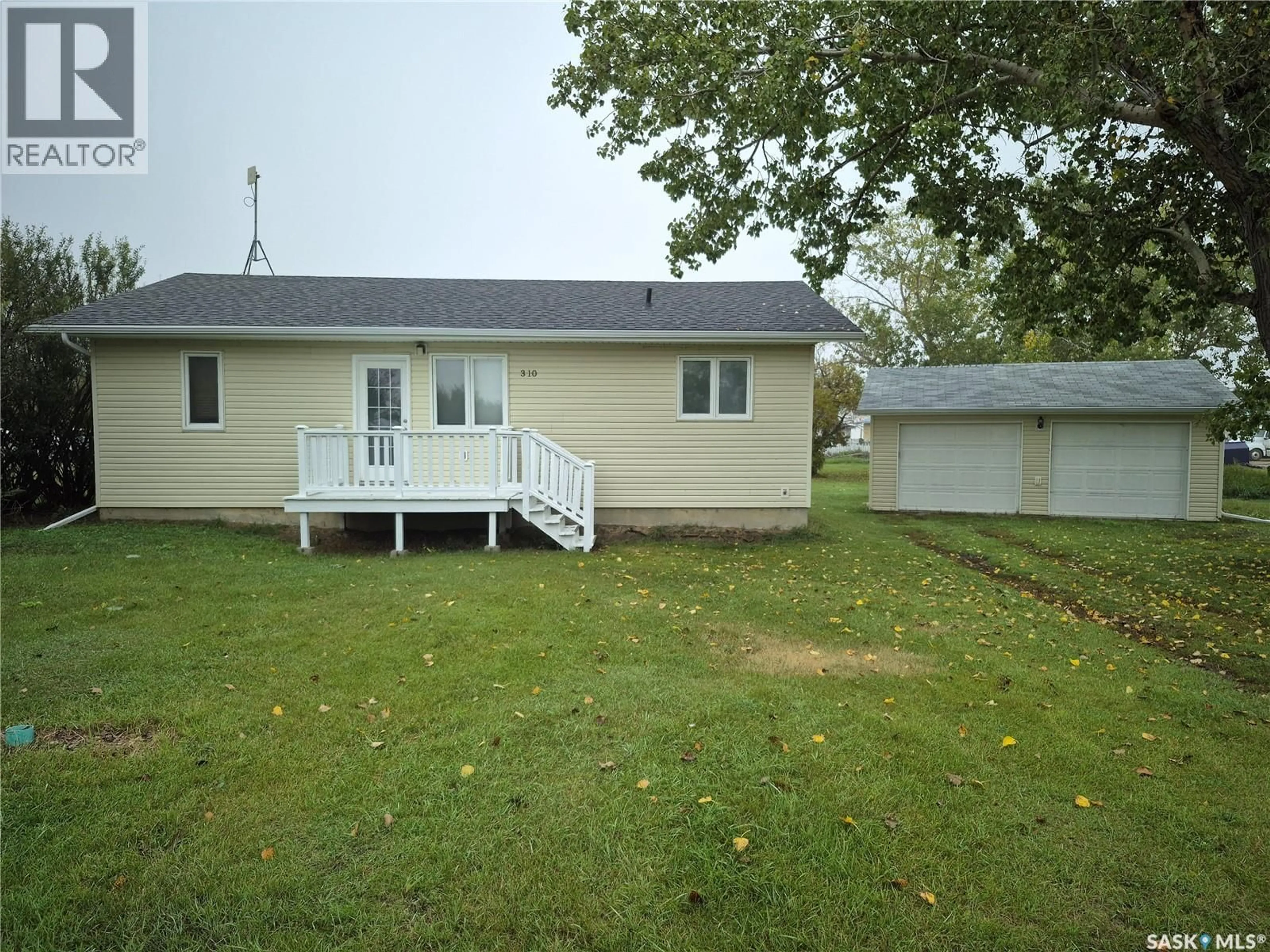 A pic from outside/outdoor area/front of a property/back of a property/a pic from drone, unknown for 310 2ND STREET, Lang Saskatchewan S0G2W0