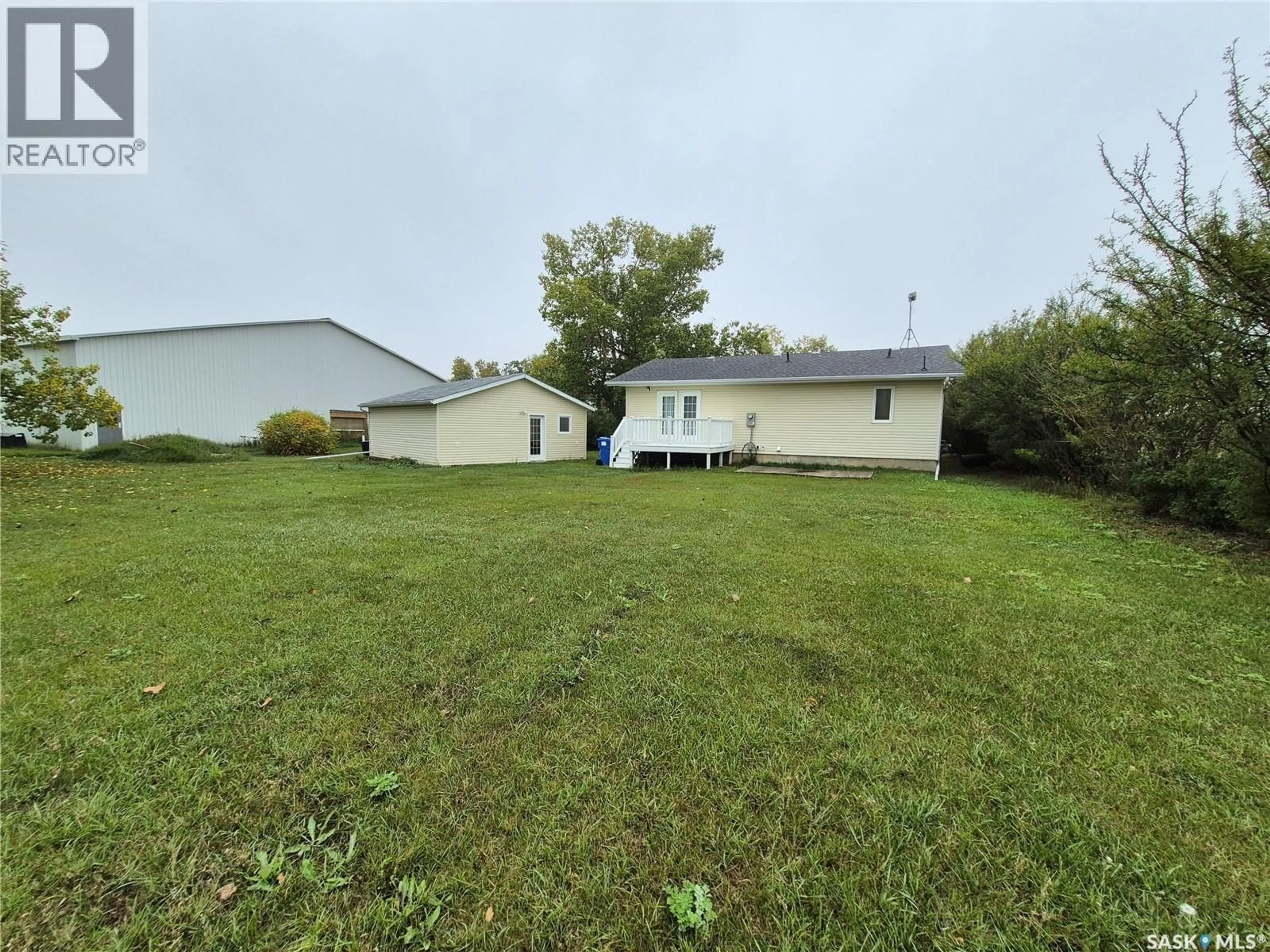 A pic from outside/outdoor area/front of a property/back of a property/a pic from drone, unknown for 310 2ND STREET, Lang Saskatchewan S0G2W0