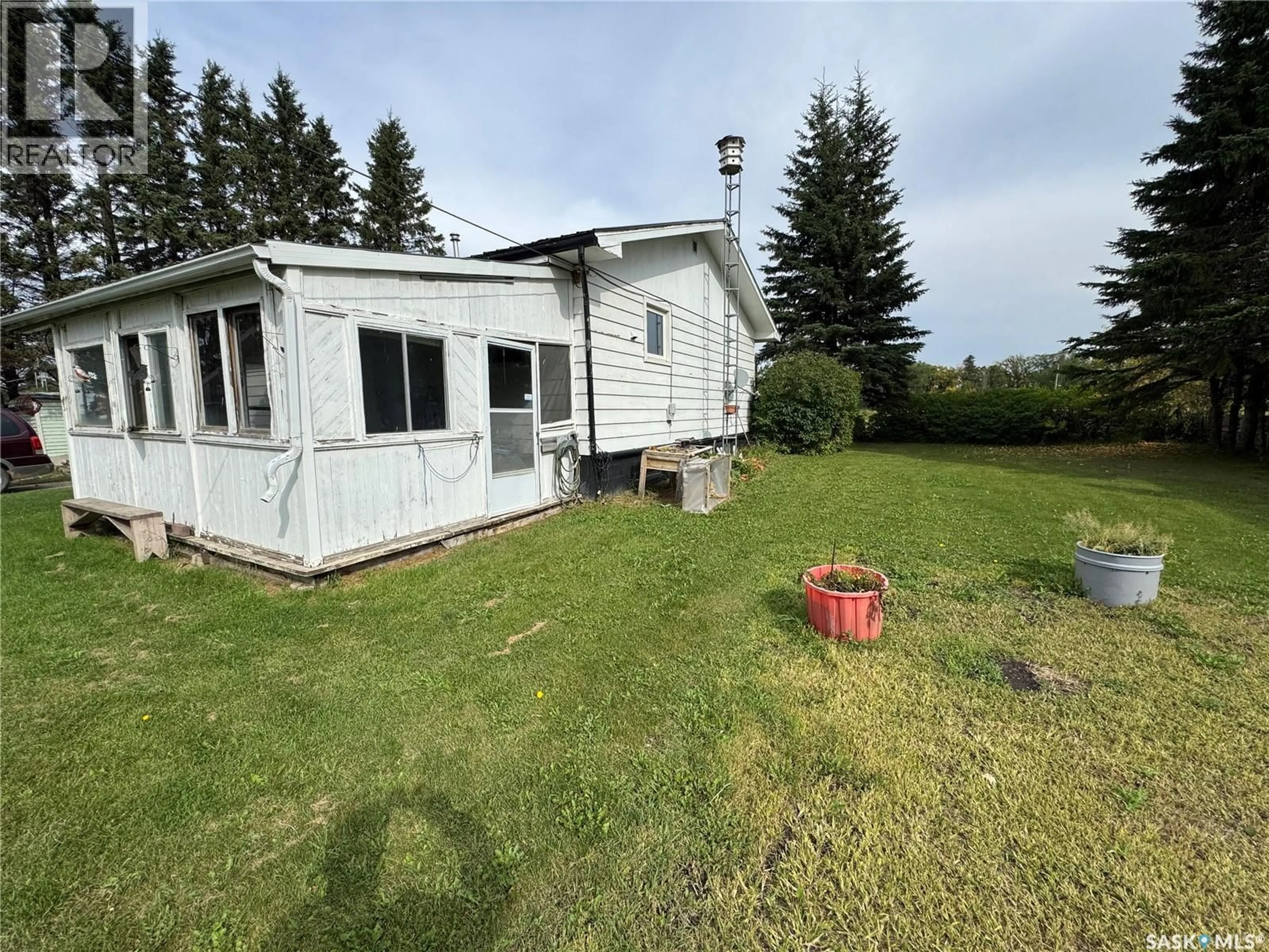 A pic from outside/outdoor area/front of a property/back of a property/a pic from drone, unknown for 100 1ST AVENUE, Spalding Saskatchewan S0K4C0