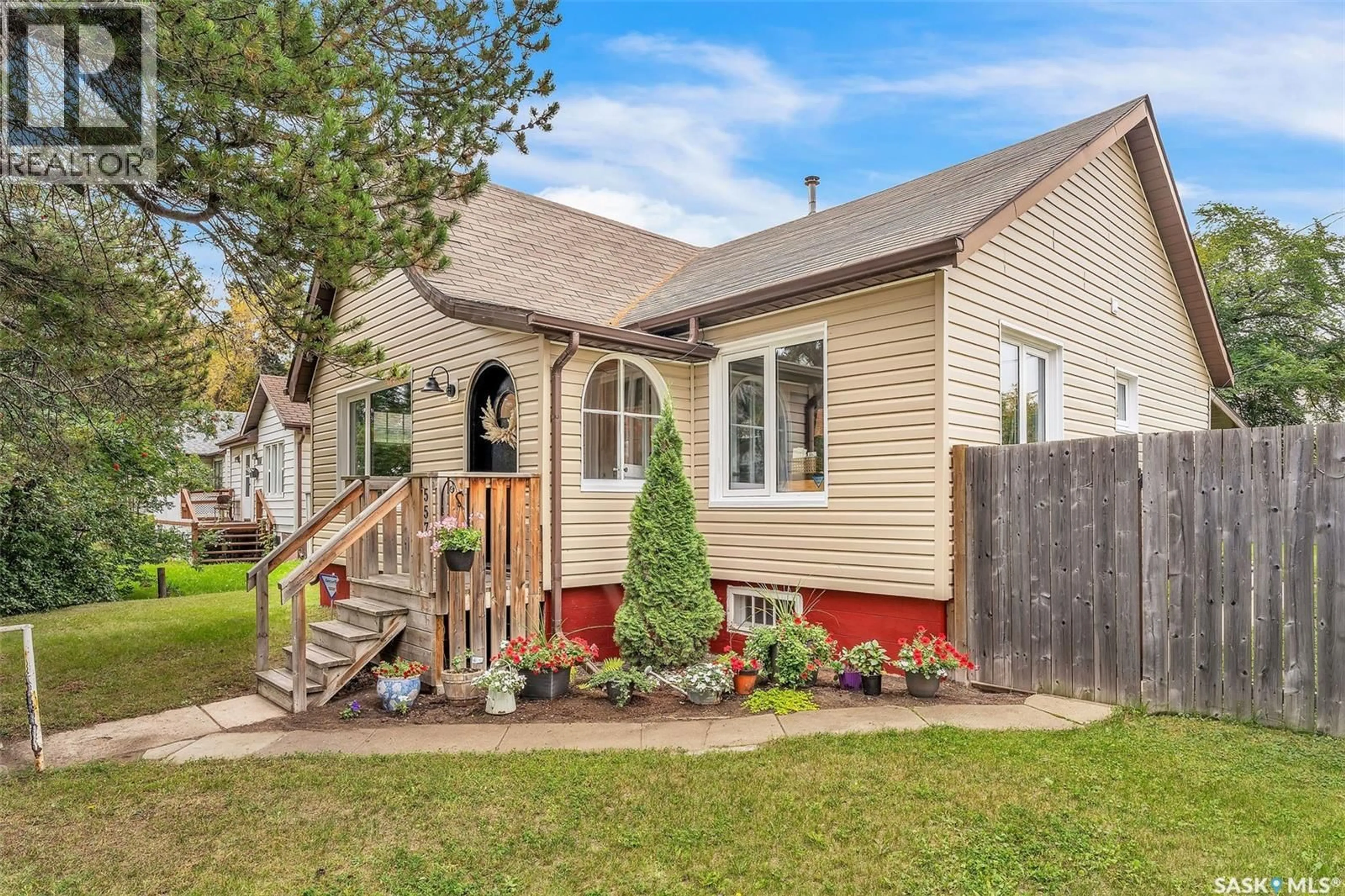 Home with vinyl exterior material, street for 557 13TH STREET, Prince Albert Saskatchewan S6V3G8