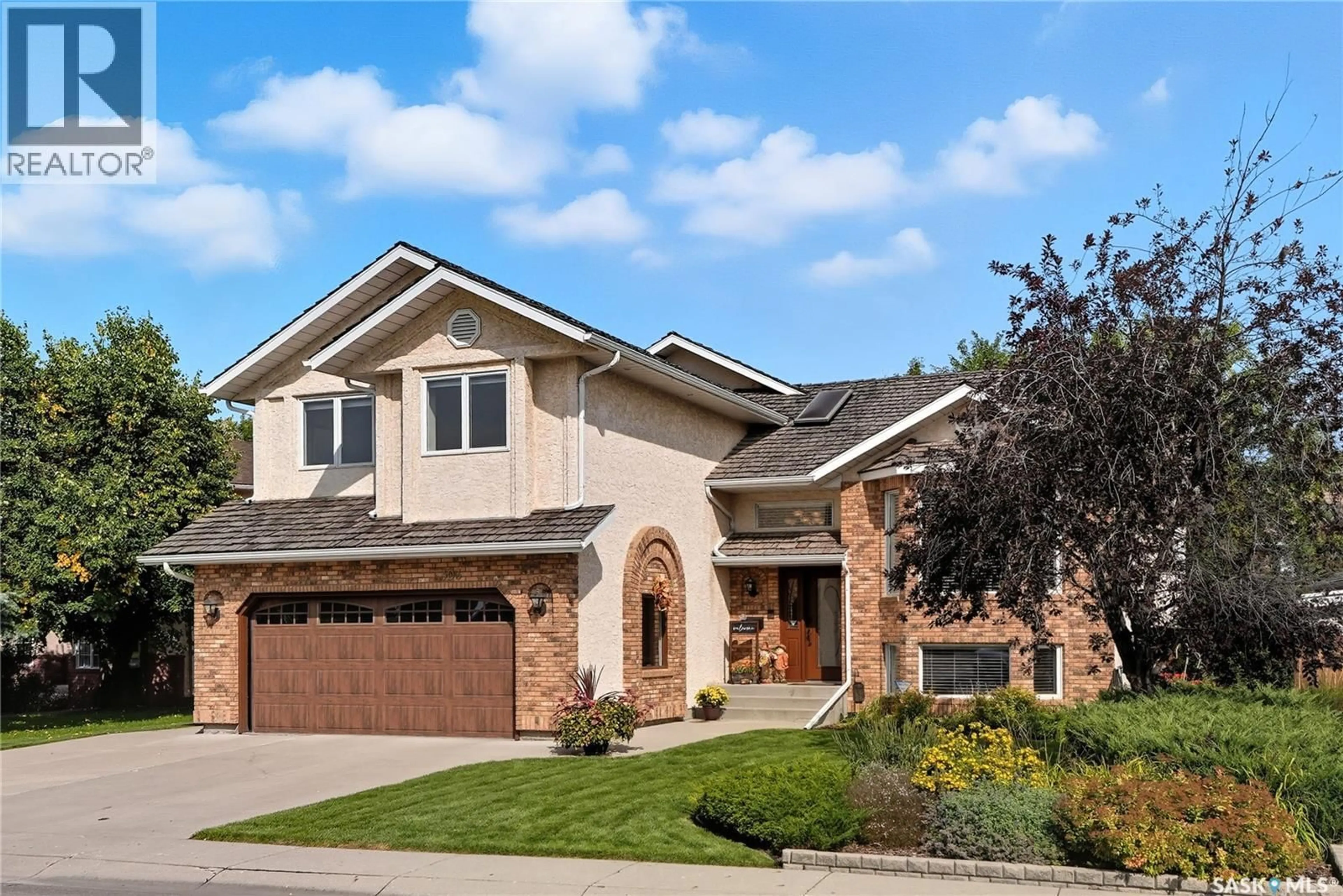 Home with brick exterior material, street for 303 BRAEBURN CRESCENT, Saskatoon Saskatchewan S7V1A4