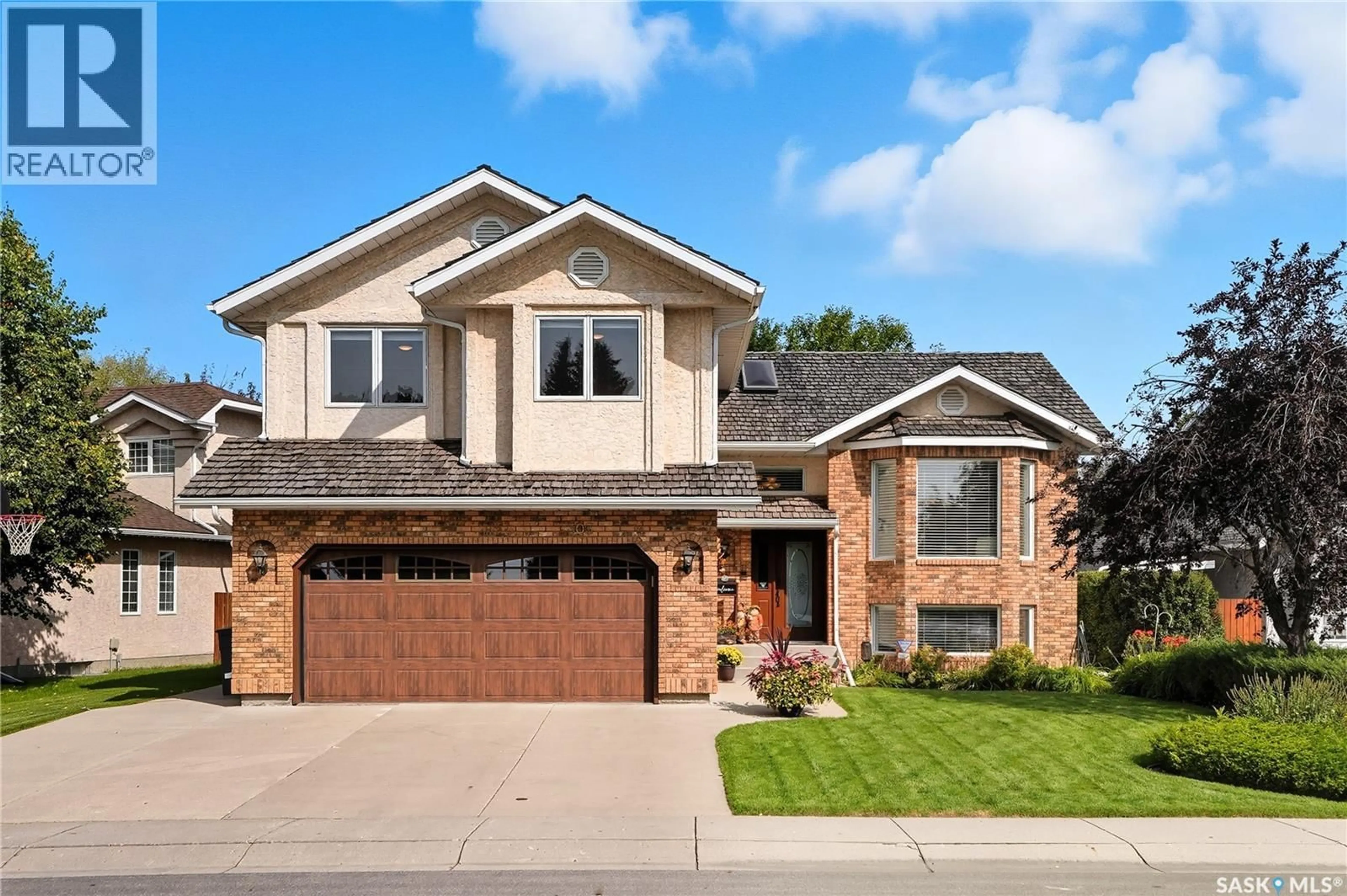 Home with brick exterior material, street for 303 BRAEBURN CRESCENT, Saskatoon Saskatchewan S7V1A4