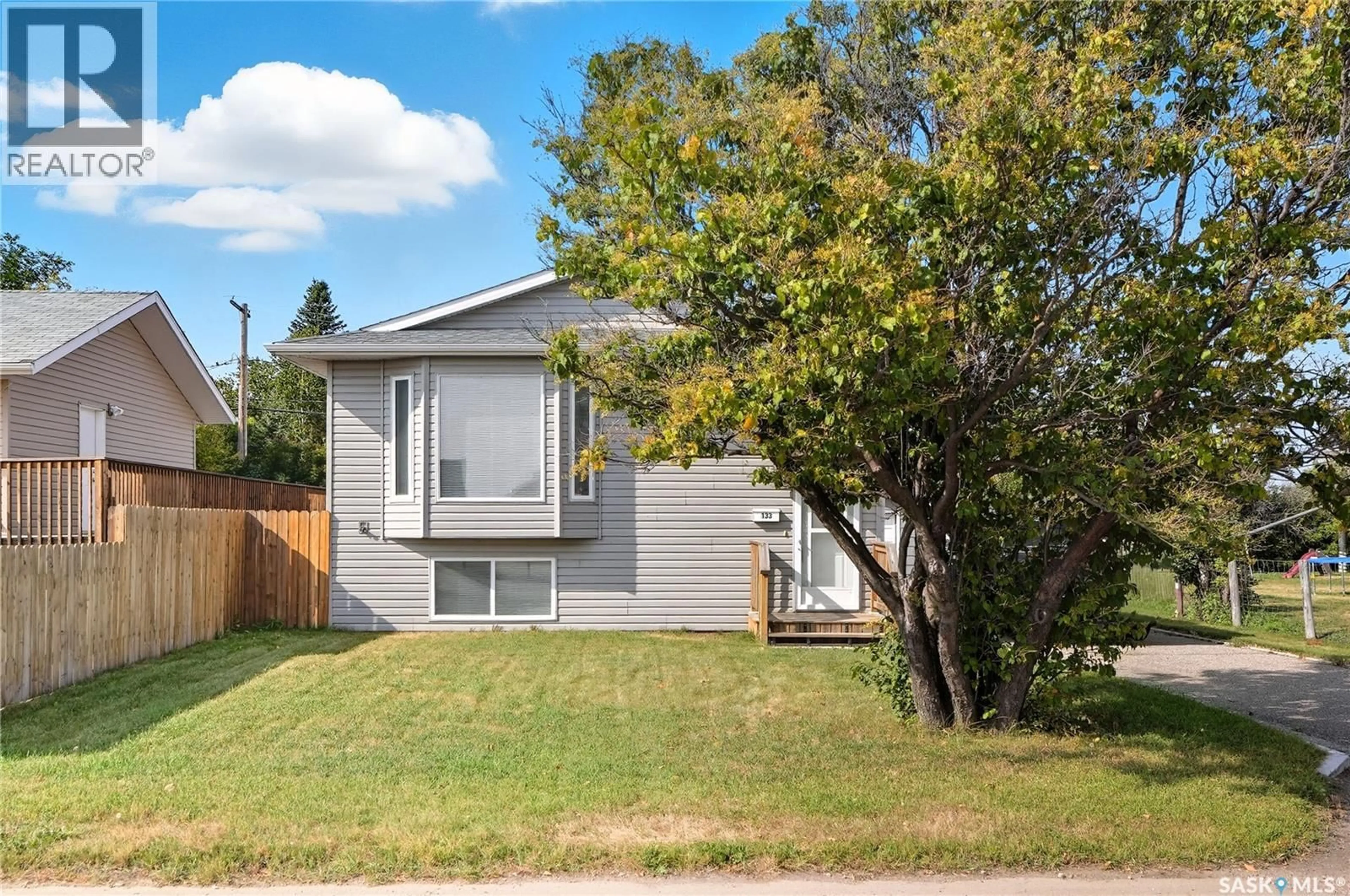 Home with vinyl exterior material, street for 133 RAILWAY AVENUE, Vanscoy Saskatchewan S0L3J0