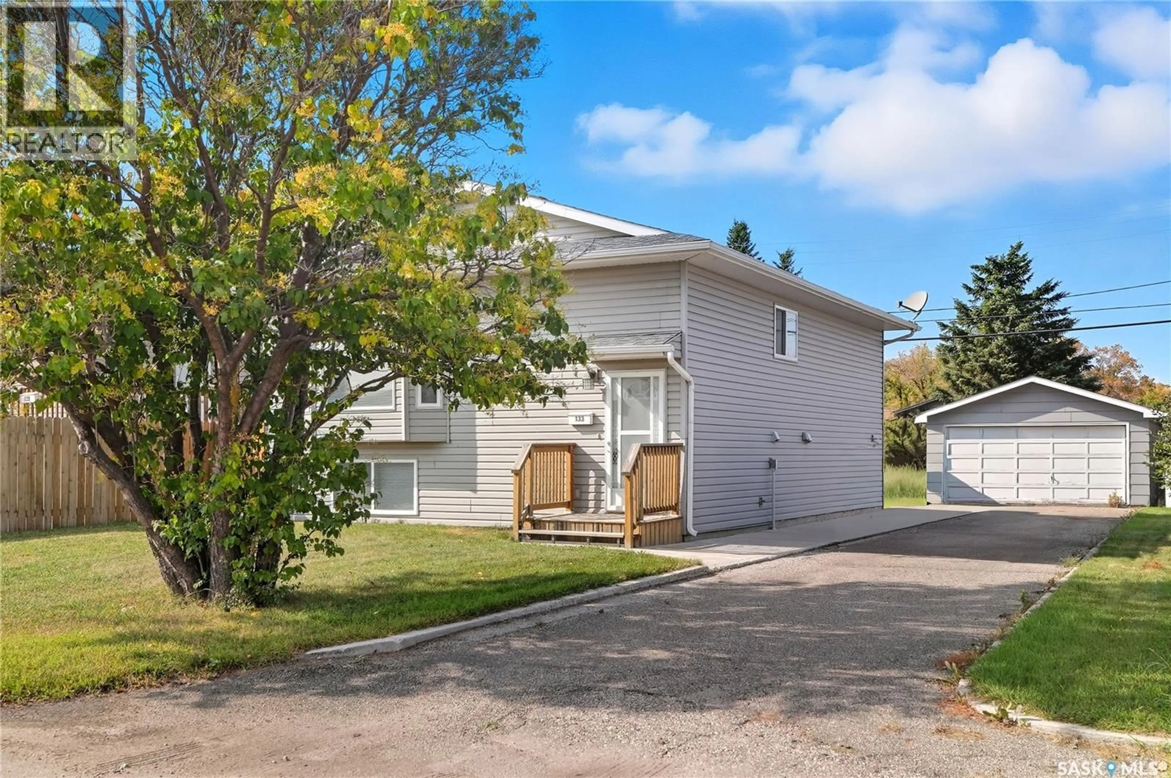 Home with vinyl exterior material, street for 133 RAILWAY AVENUE, Vanscoy Saskatchewan S0L3J0