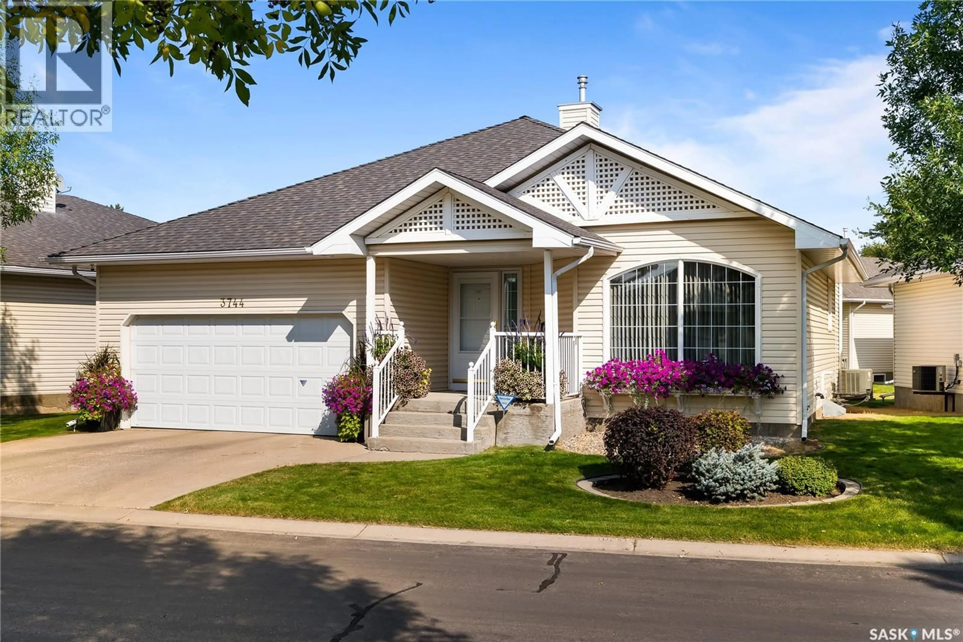 Home with vinyl exterior material, street for 3744 QUEENS GATE, Regina Saskatchewan S4S7J1