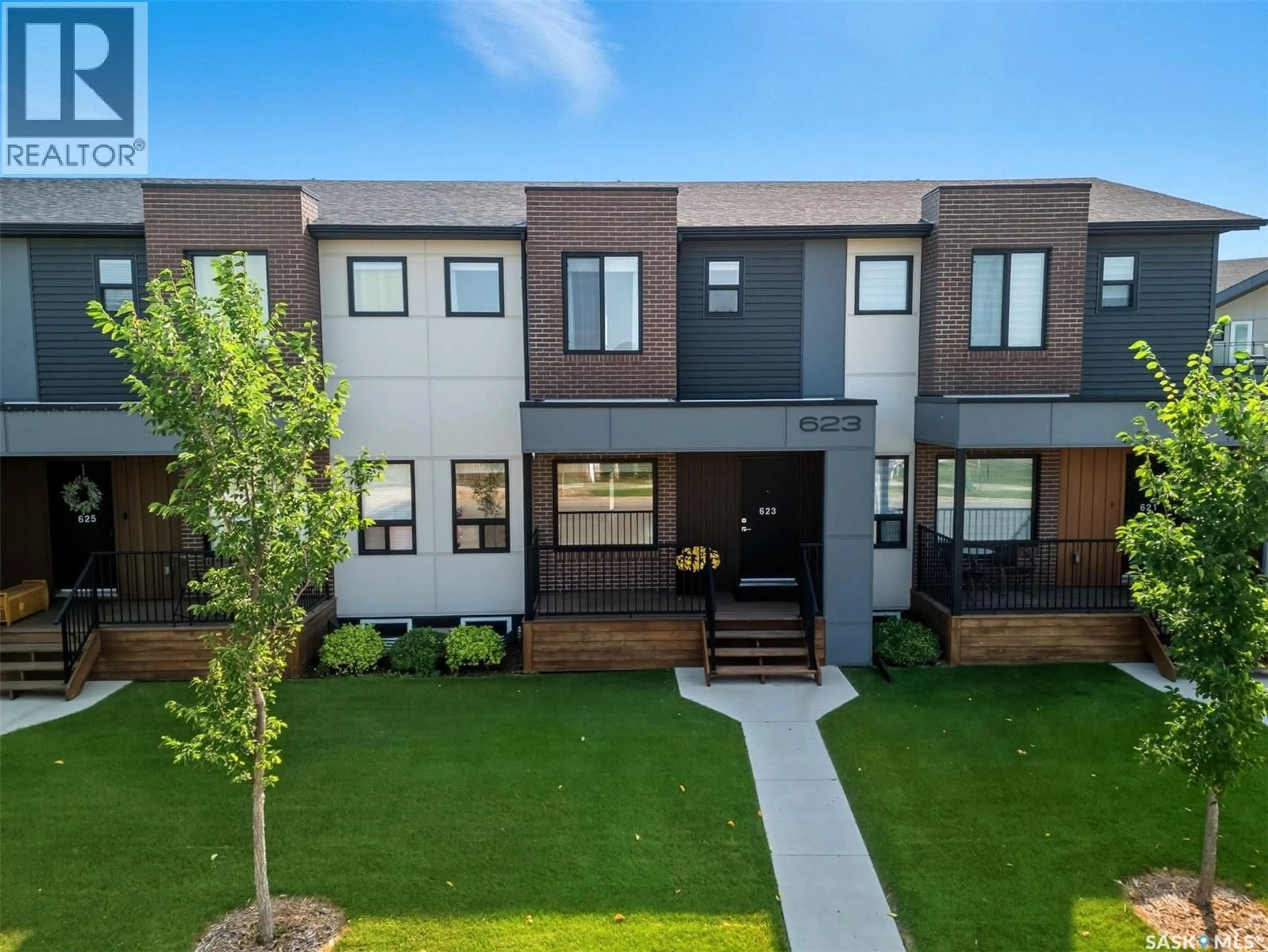 Home with brick exterior material, street for 623 EVERGREEN BOULEVARD, Saskatoon Saskatchewan S7W0Y7