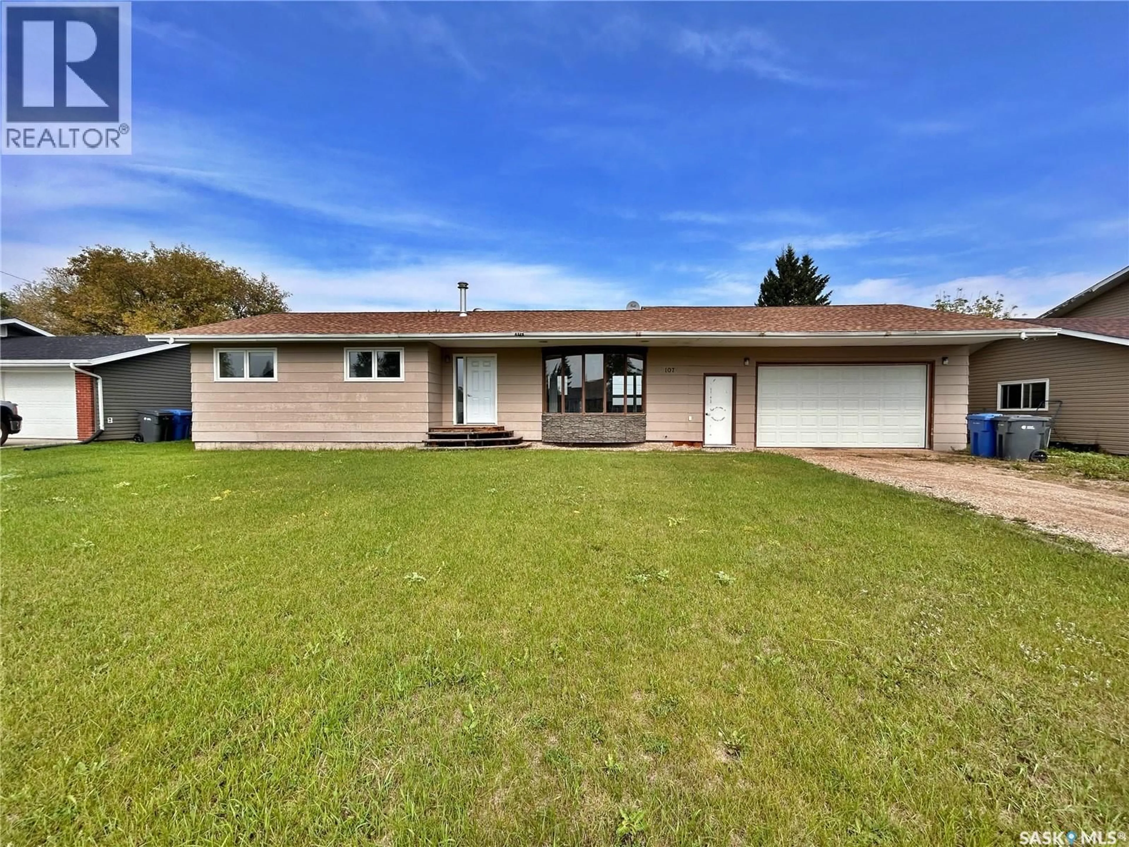 A pic from outside/outdoor area/front of a property/back of a property/a pic from drone, street for 107 CLEMENTS AVENUE, Wawota Saskatchewan S0G5A0