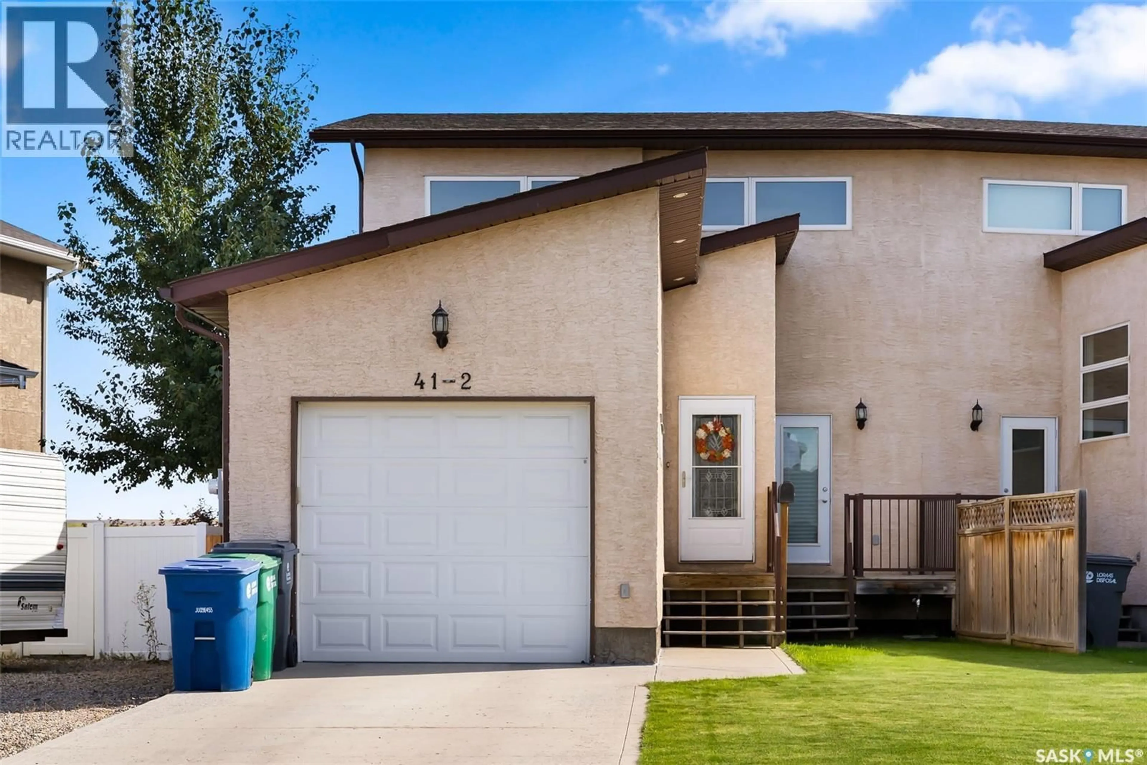 Home with vinyl exterior material, street for 2 41 QU'APPELLE CRESCENT, Balgonie Saskatchewan S0G0E0
