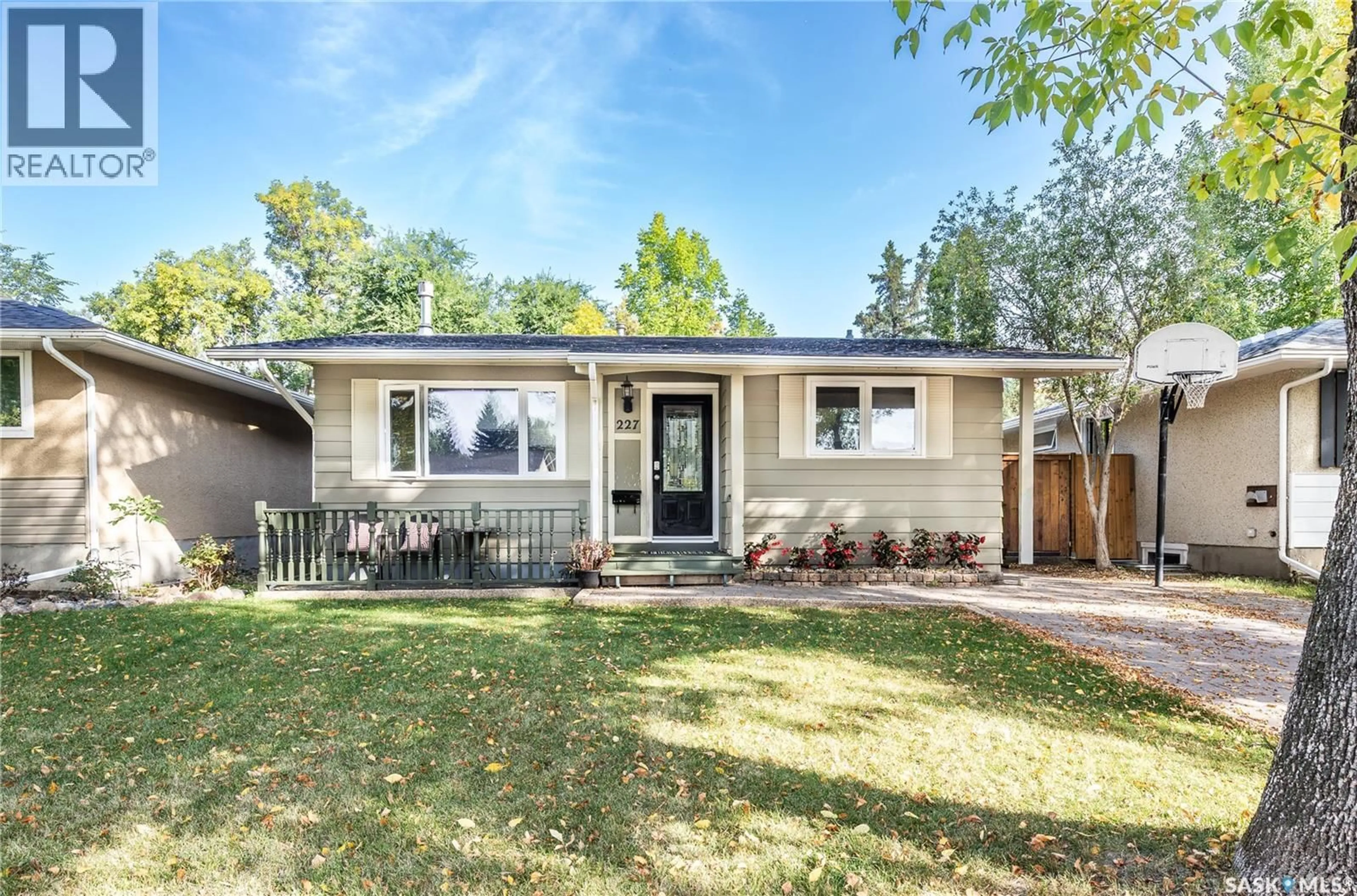 Home with vinyl exterior material, street for 227 MCMASTER CRESCENT, Saskatoon Saskatchewan S7H4E4