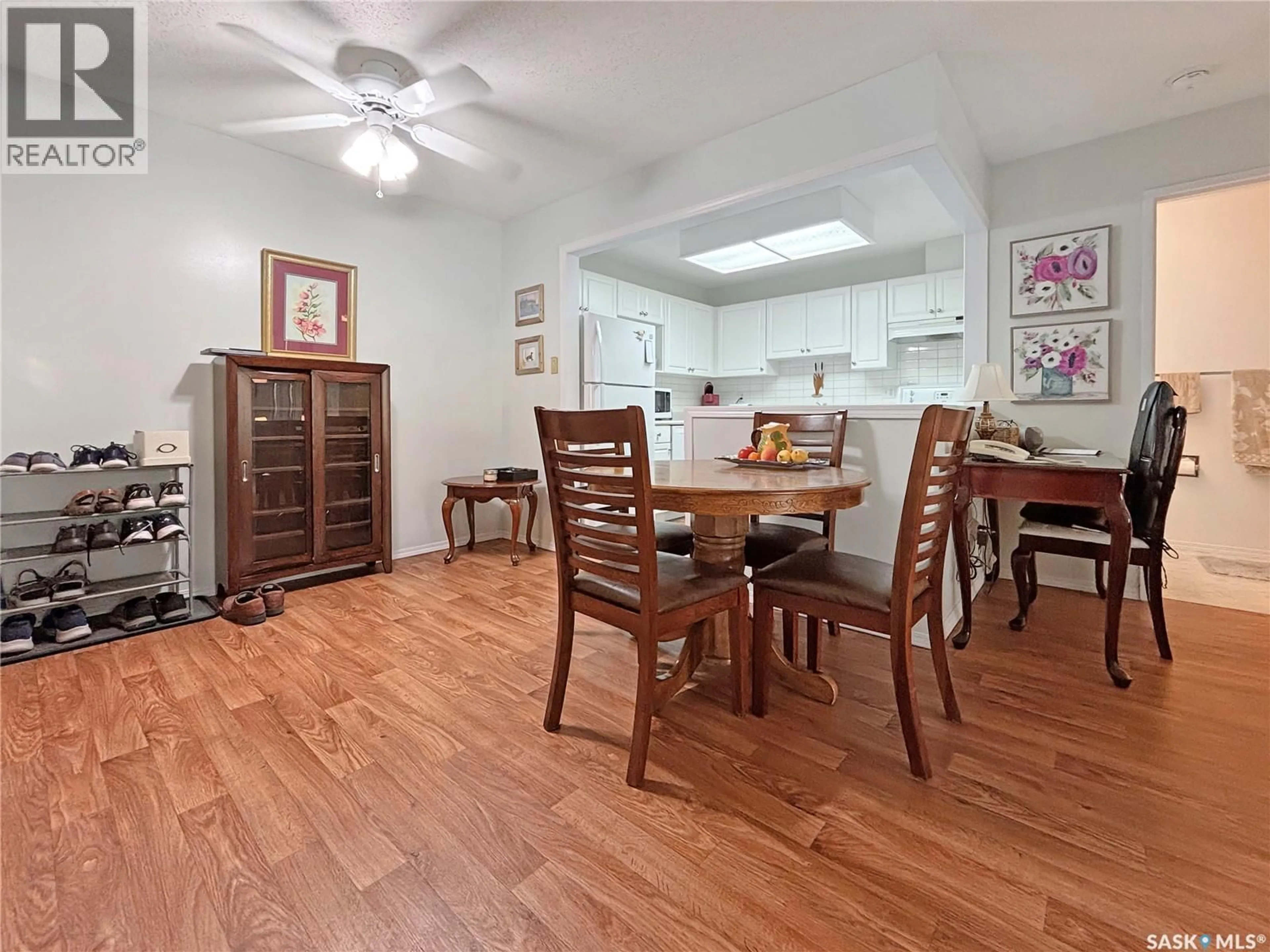 Dining room, wood/laminate floor for 308 - 201 CREE PLACE, Saskatoon Saskatchewan S7K7Z3