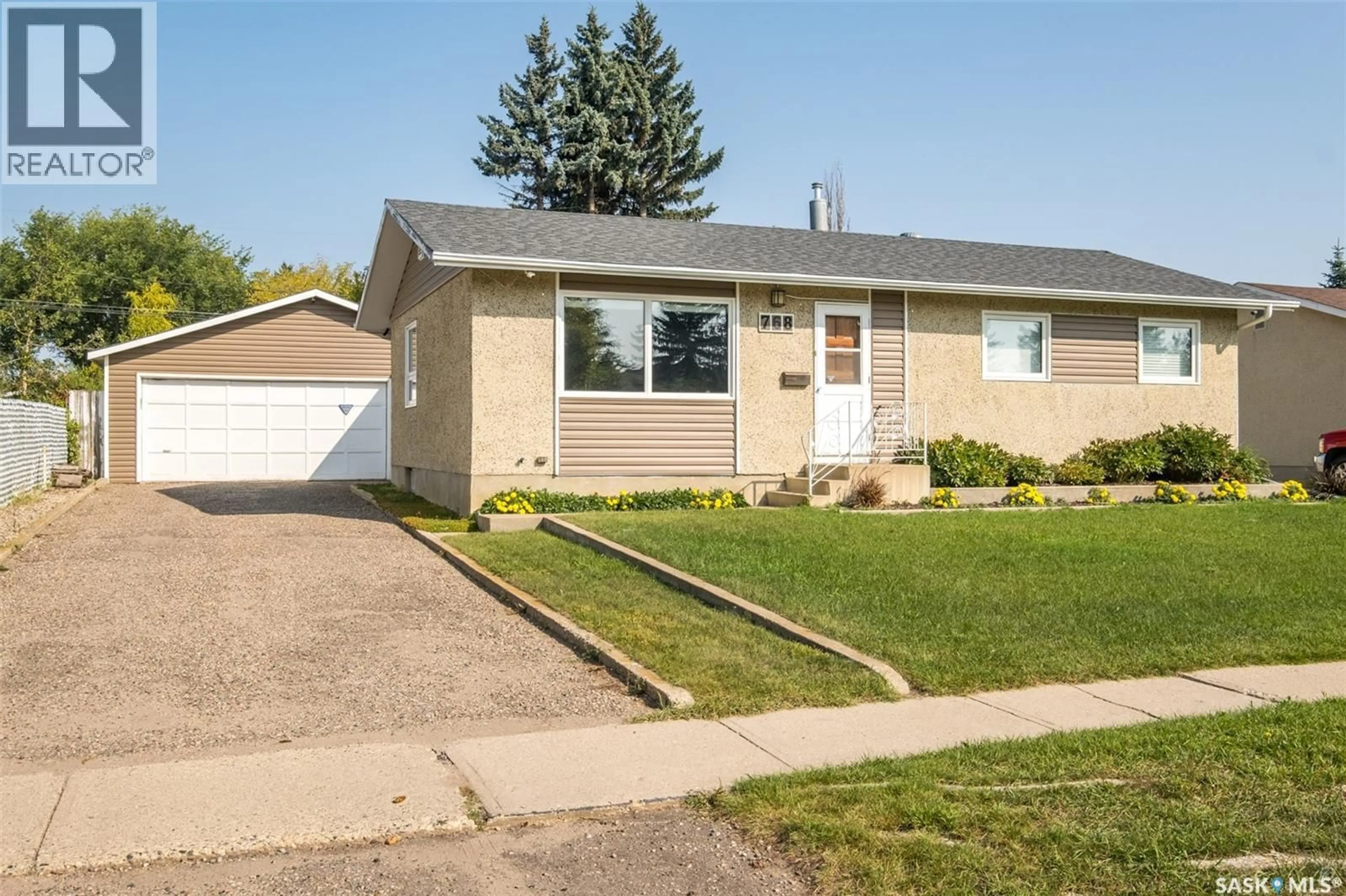 Home with vinyl exterior material, street for 768 28TH STREET, Prince Albert Saskatchewan S6V1X9