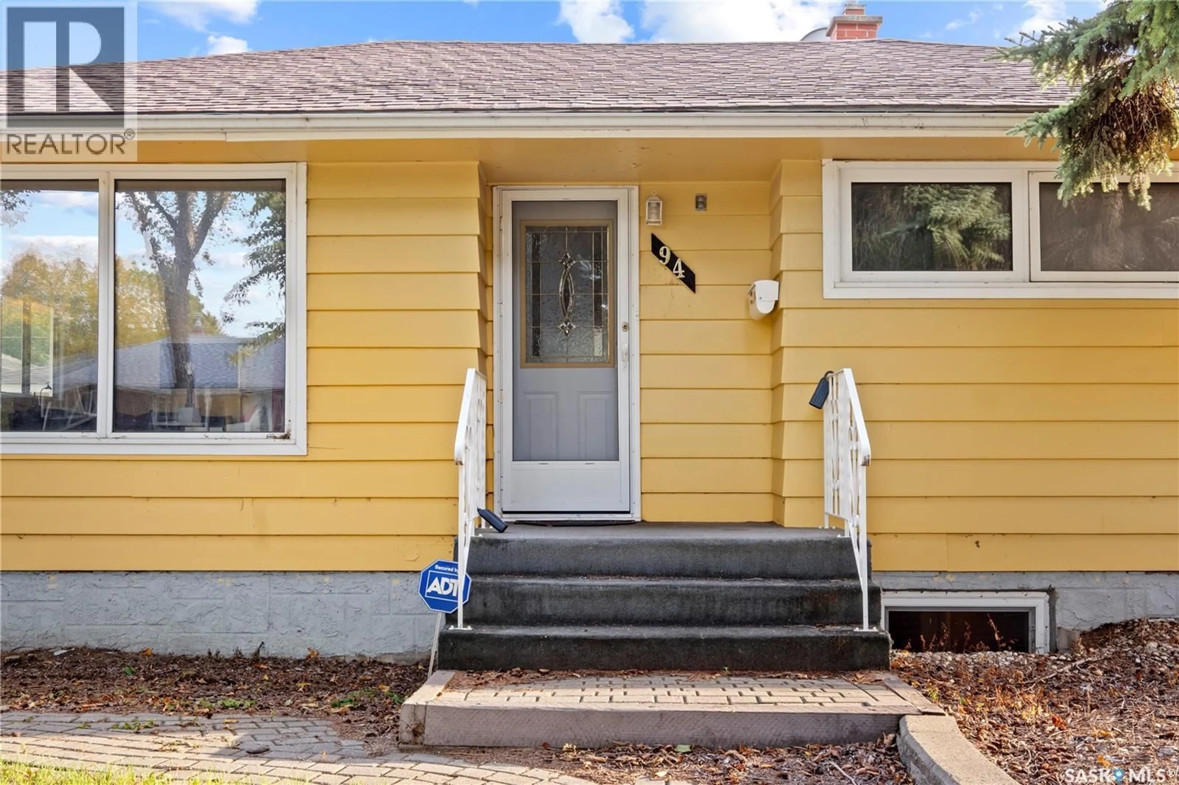 Home with vinyl exterior material, street for 94 DUNNING CRESCENT, Regina Saskatchewan S4S3W1