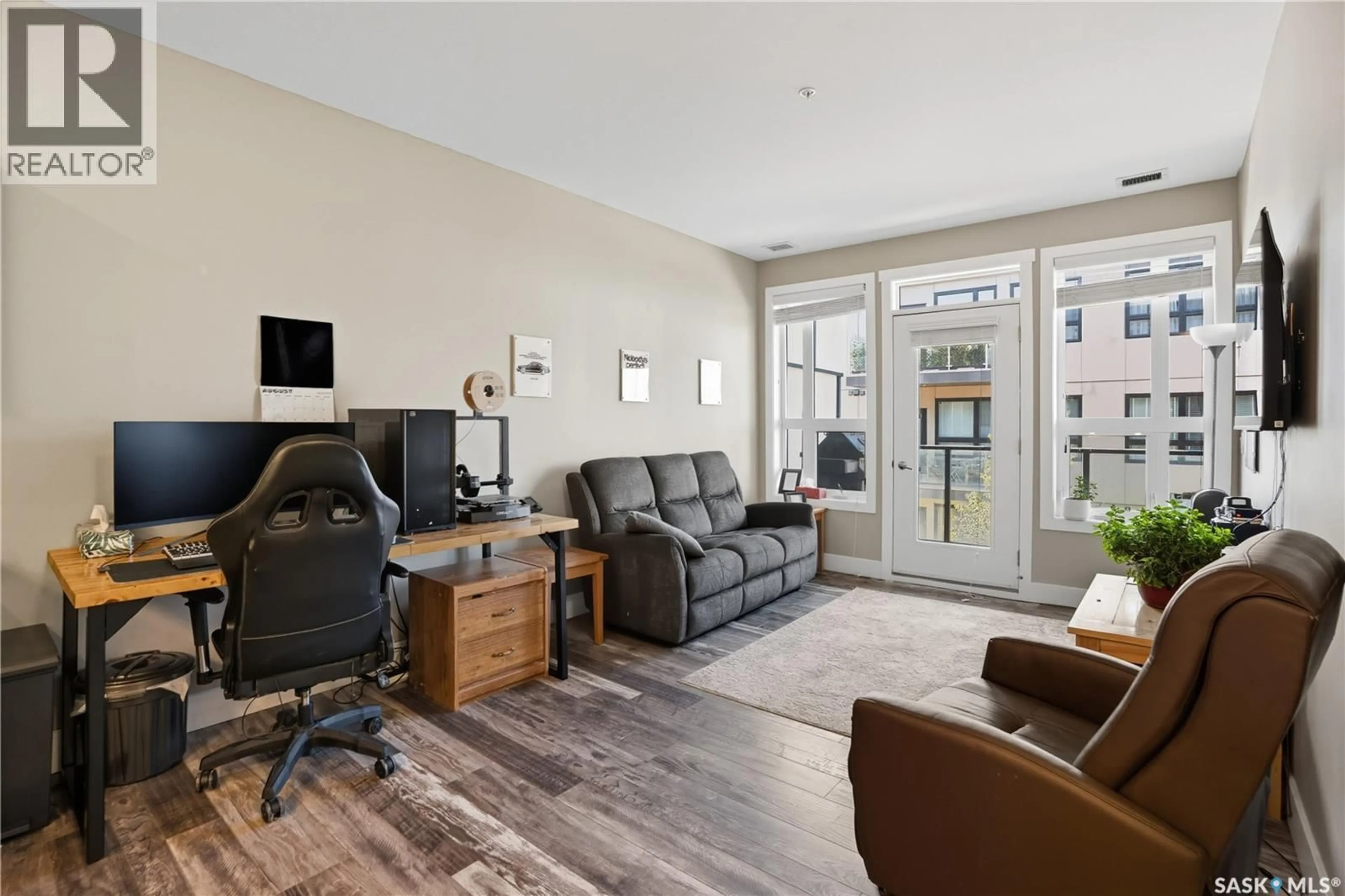 Living room with furniture, unknown for 415 - 218 MANINGAS BEND, Saskatoon Saskatchewan S7W0T6