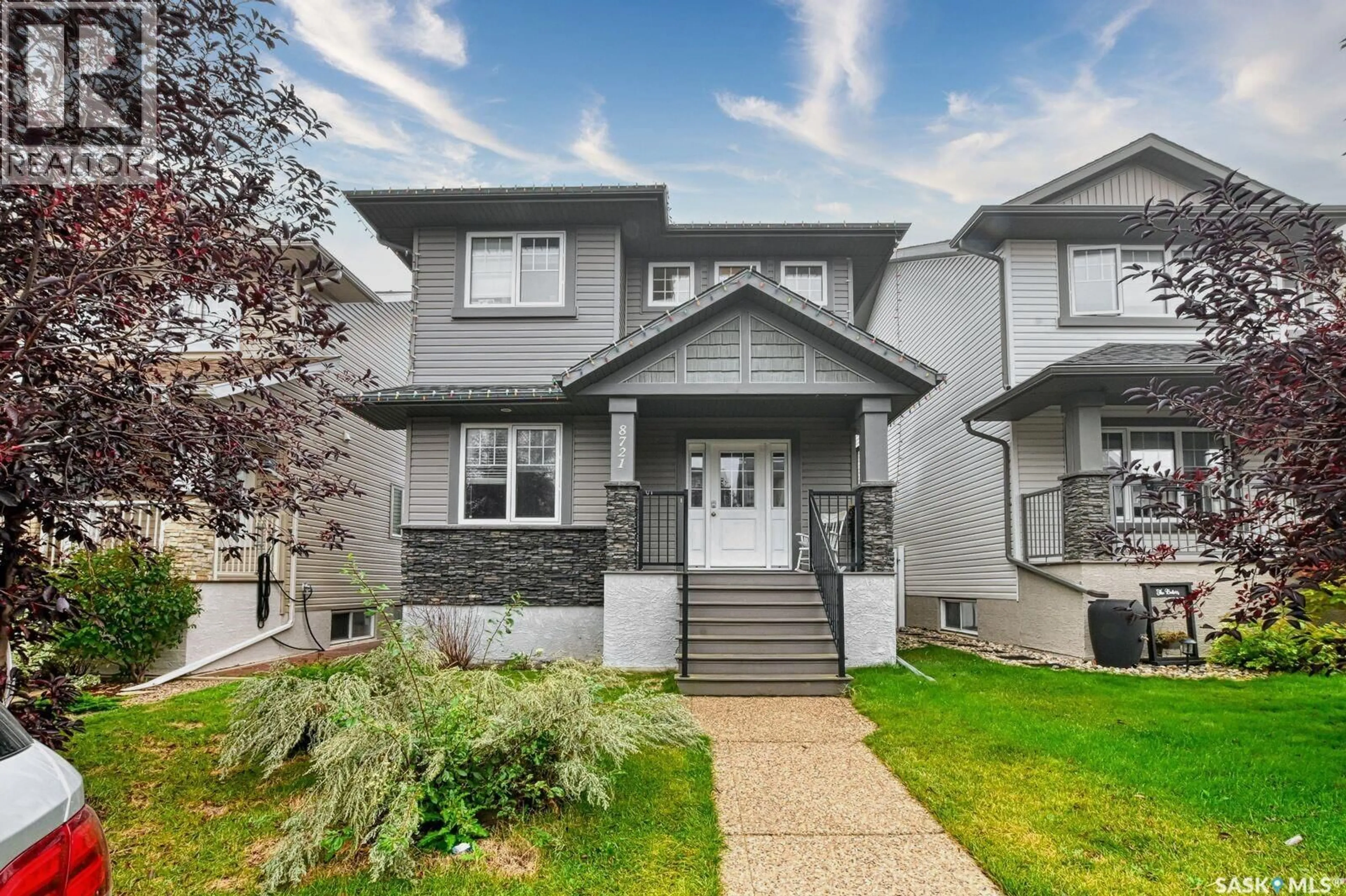 Home with vinyl exterior material, street for 8721 ARCHER LANE, Regina Saskatchewan S4Y0B9