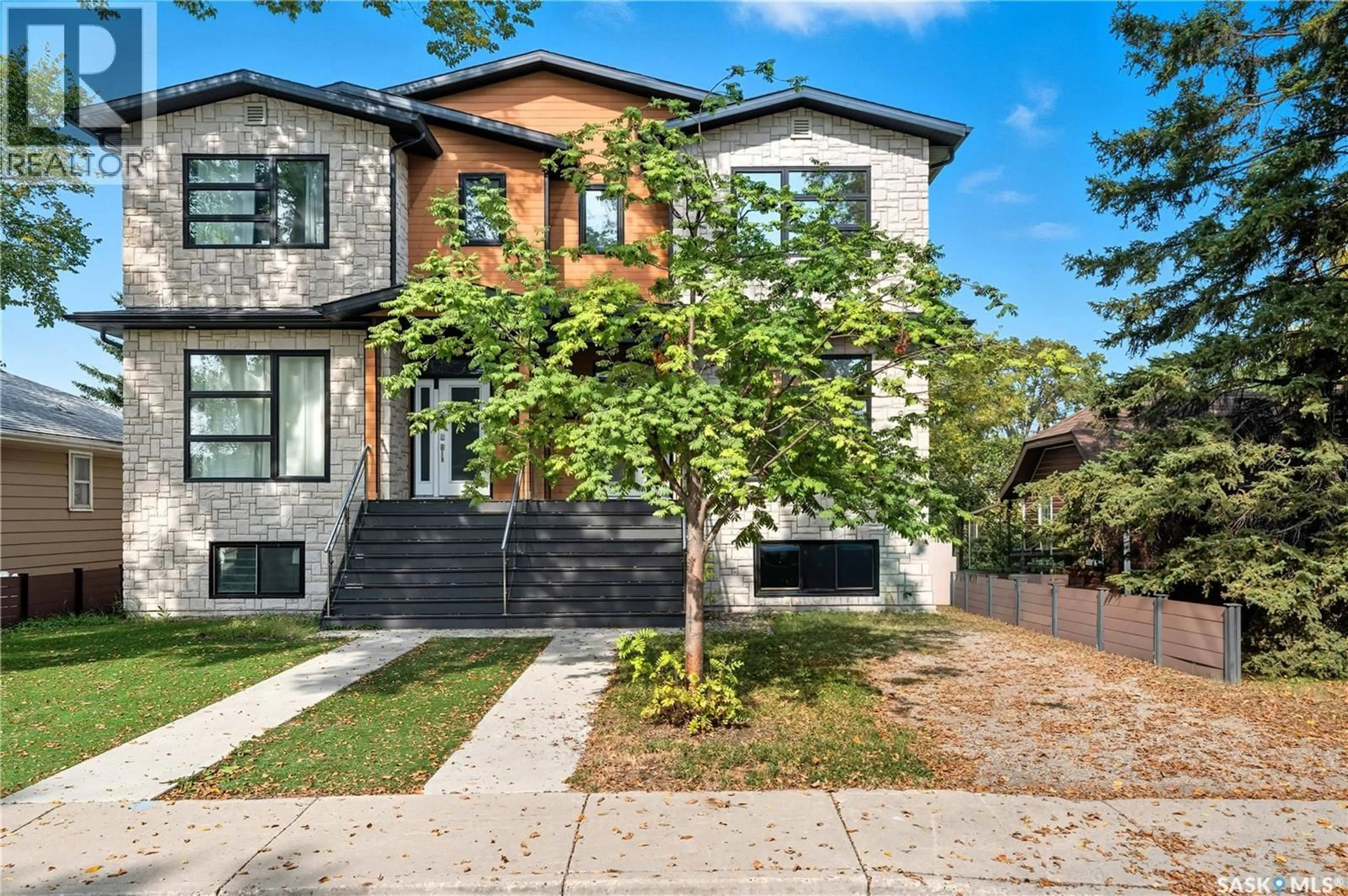 Home with brick exterior material, street for 1105 7TH STREET, Saskatoon Saskatchewan S7H0Y9