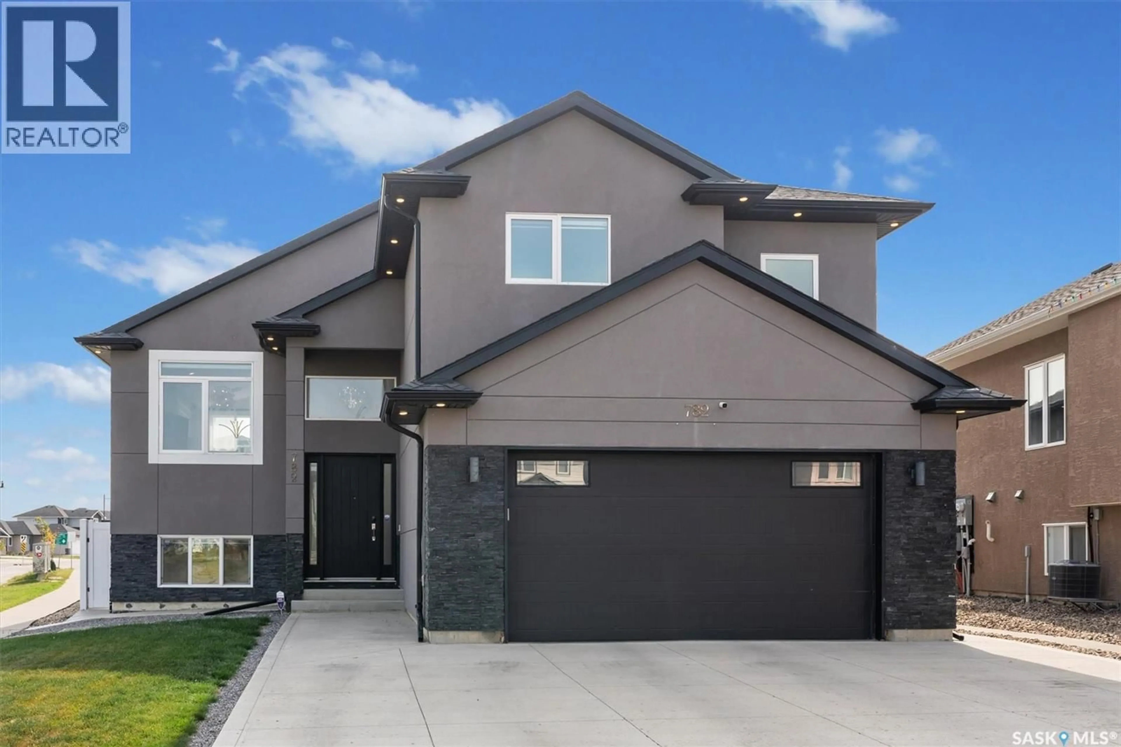 Home with vinyl exterior material, street for 782 LABINE COURT, Saskatoon Saskatchewan S7L6G7