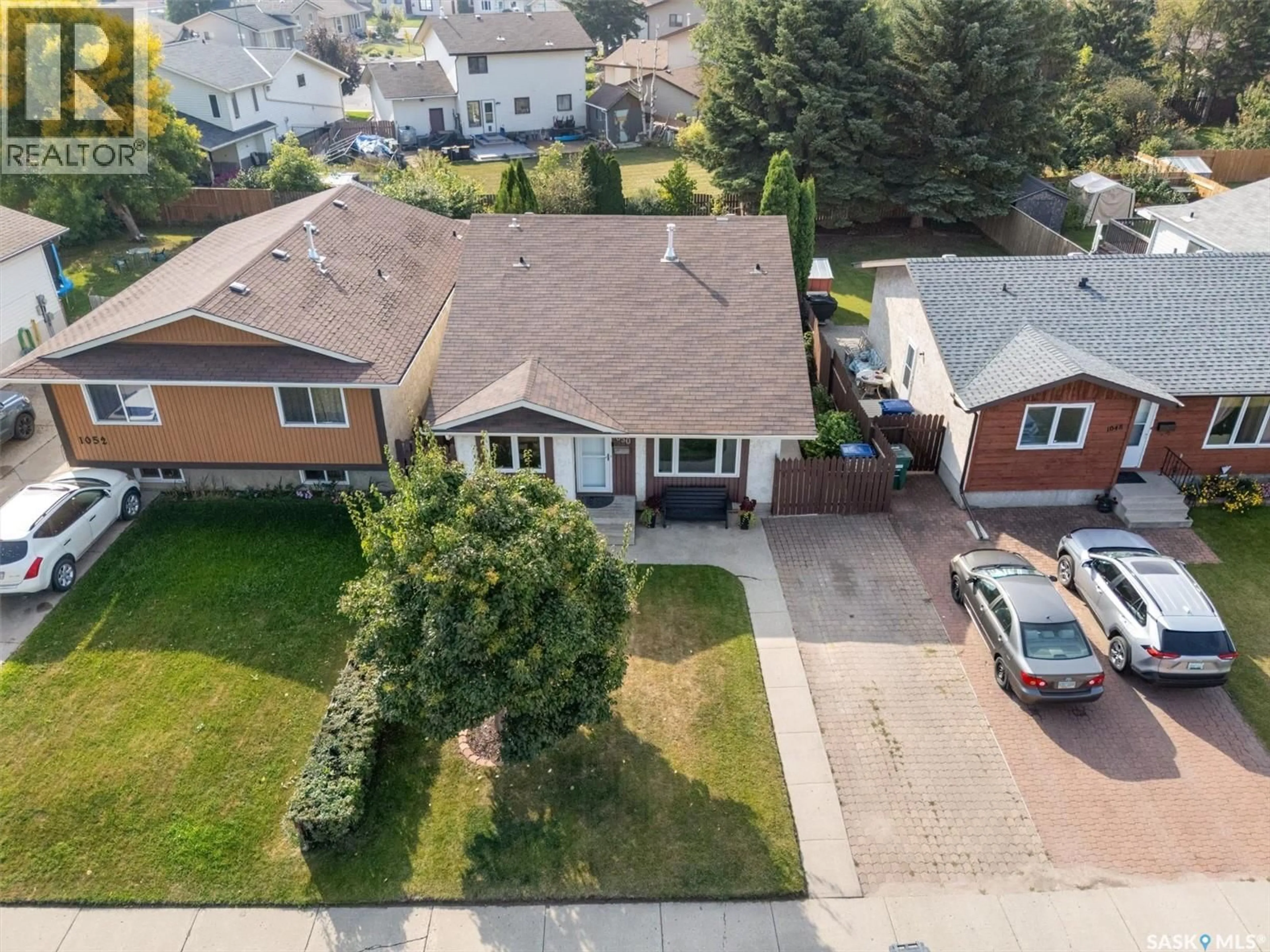 A pic from outside/outdoor area/front of a property/back of a property/a pic from drone, street for 1050 MCCORMACK ROAD, Saskatoon Saskatchewan S7M5K2