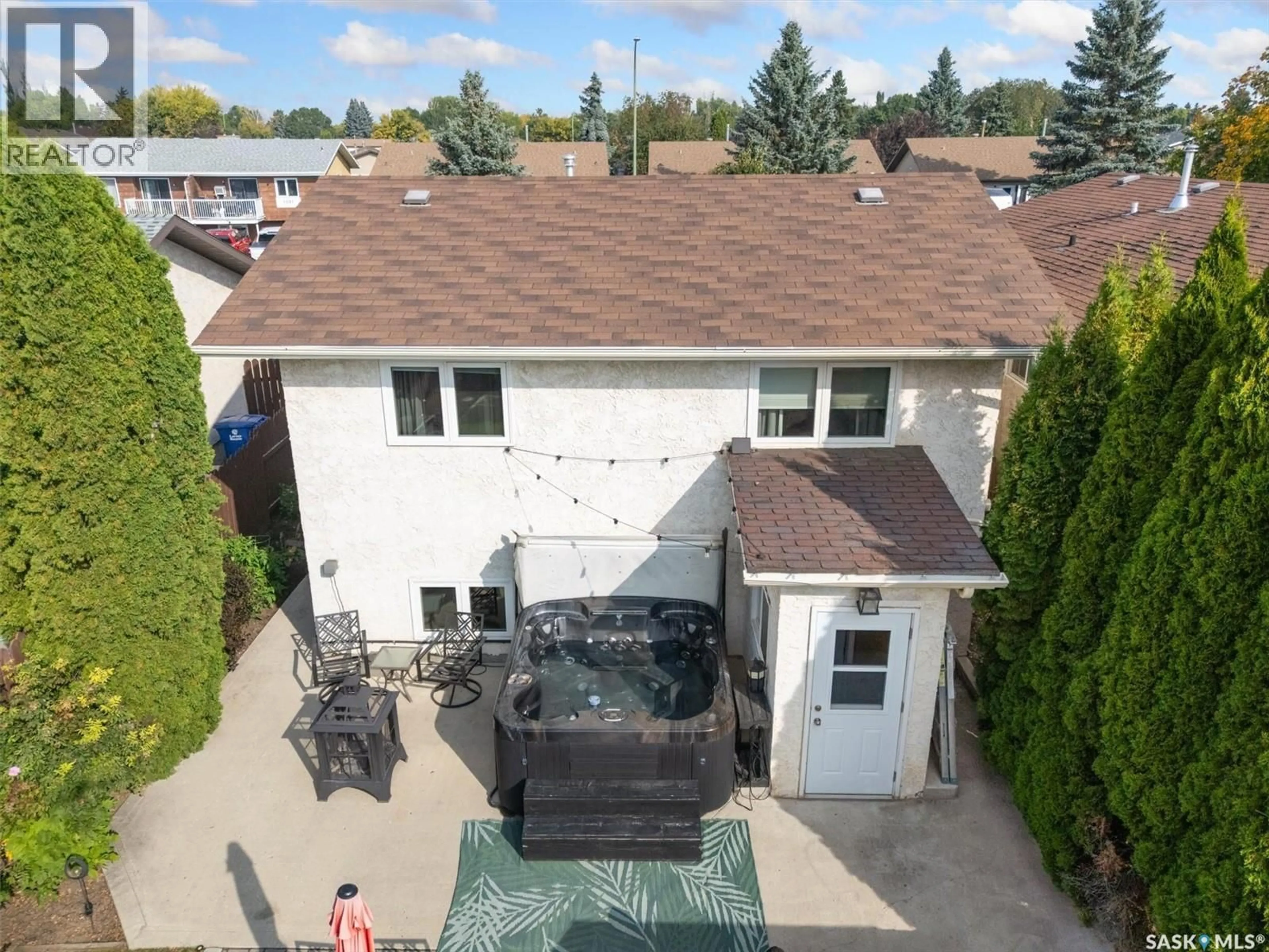 A pic from outside/outdoor area/front of a property/back of a property/a pic from drone, street for 1050 MCCORMACK ROAD, Saskatoon Saskatchewan S7M5K2