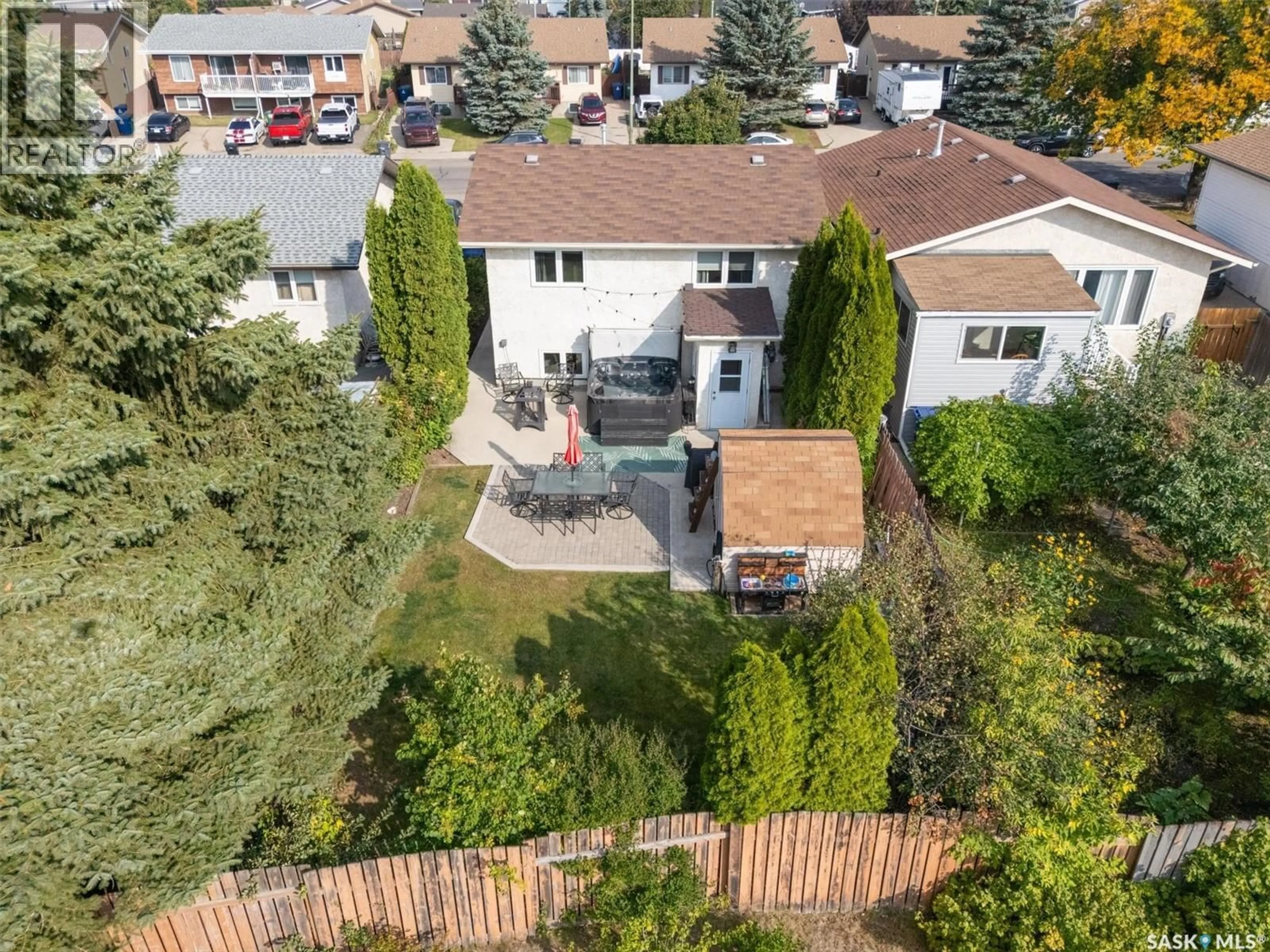 A pic from outside/outdoor area/front of a property/back of a property/a pic from drone, street for 1050 MCCORMACK ROAD, Saskatoon Saskatchewan S7M5K2