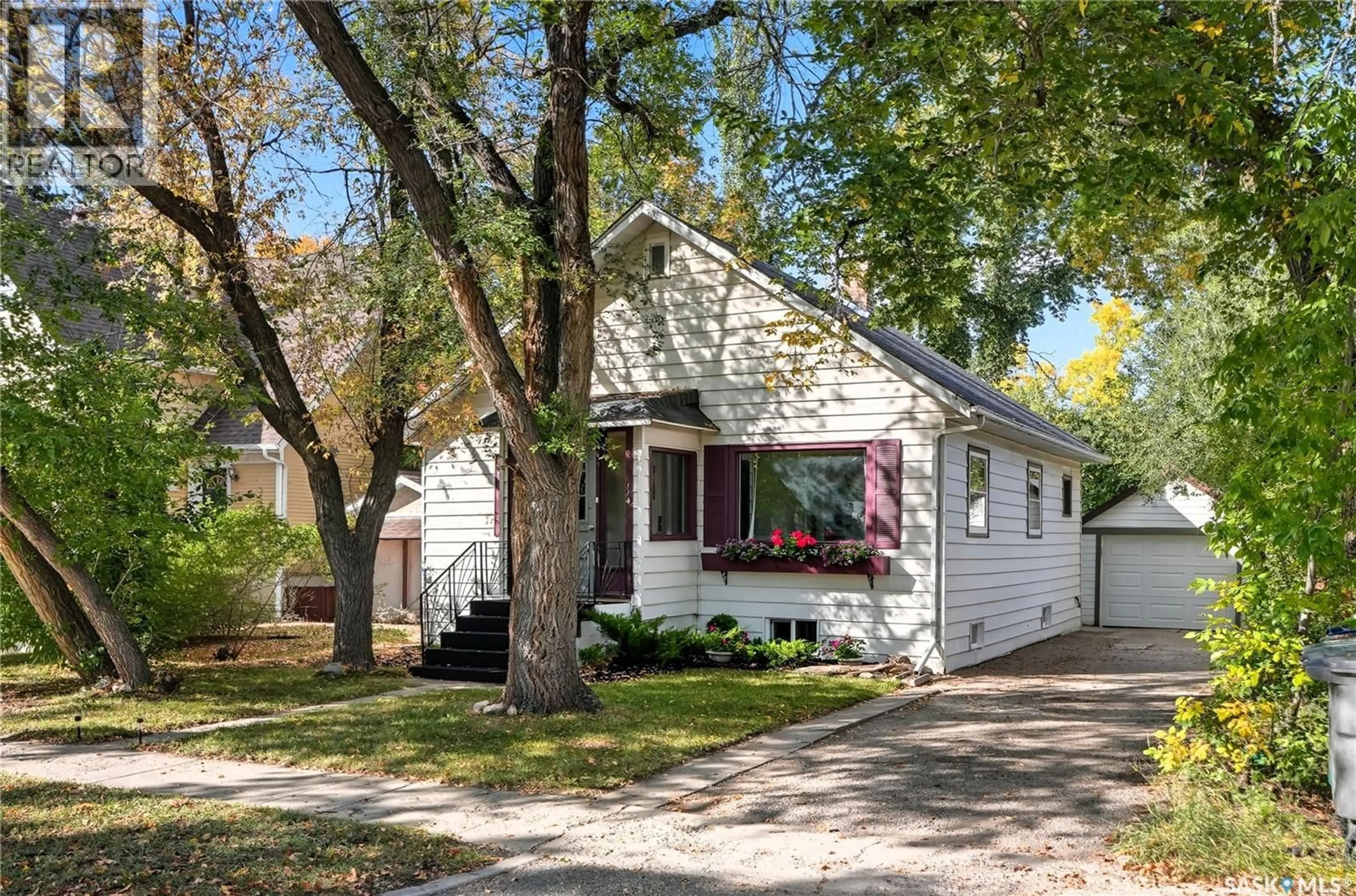 Home with vinyl exterior material, street for 114 107TH STREET, Saskatoon Saskatchewan S7N1N8