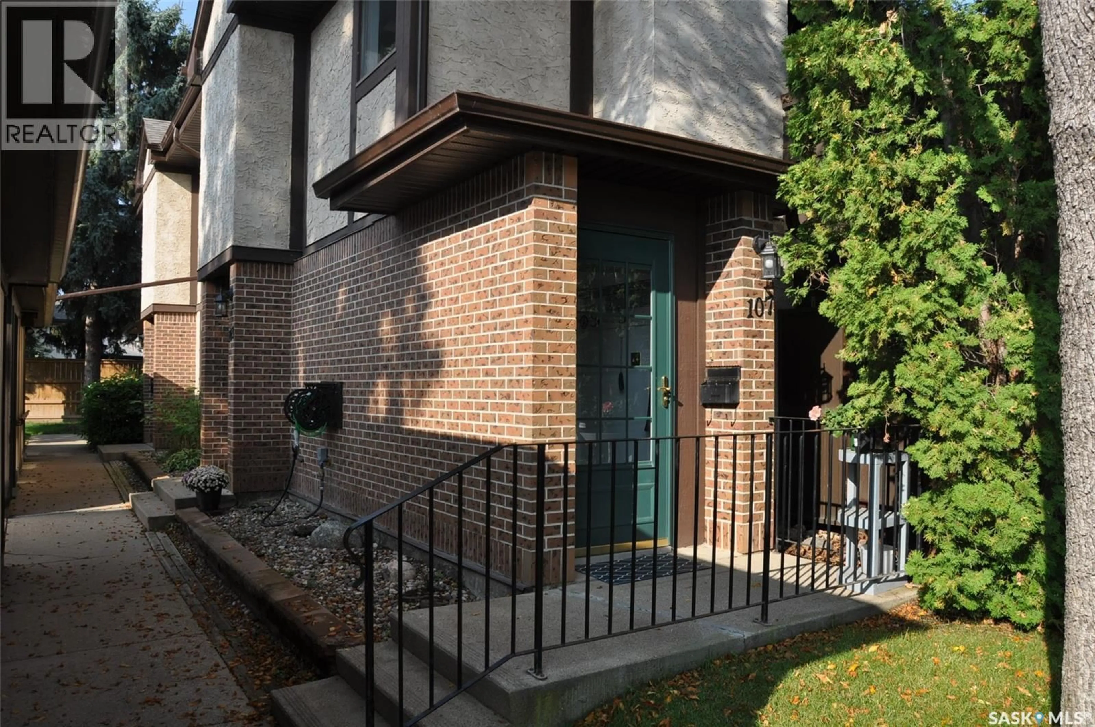 Home with brick exterior material, street for 107 - 603 LENORE DRIVE, Saskatoon Saskatchewan S7K6S1