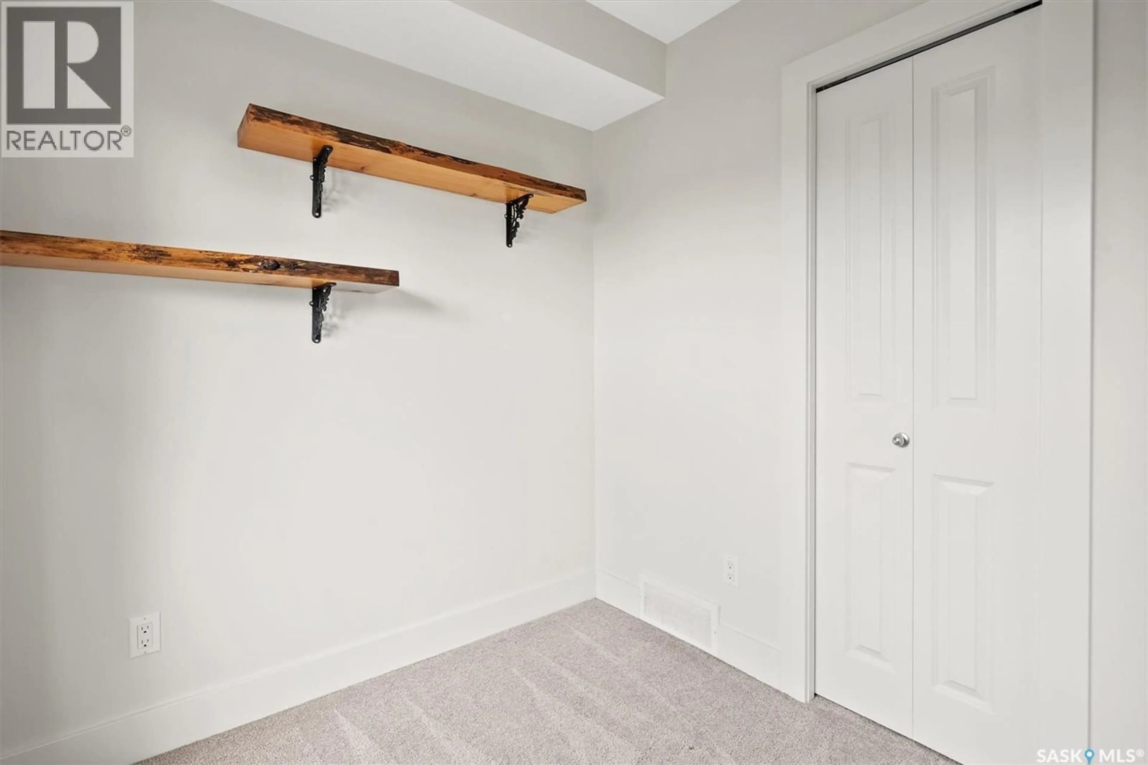 Storage room or clothes room or walk-in closet for 731 MEADOWS BOULEVARD, Saskatoon Saskatchewan S7V0M5