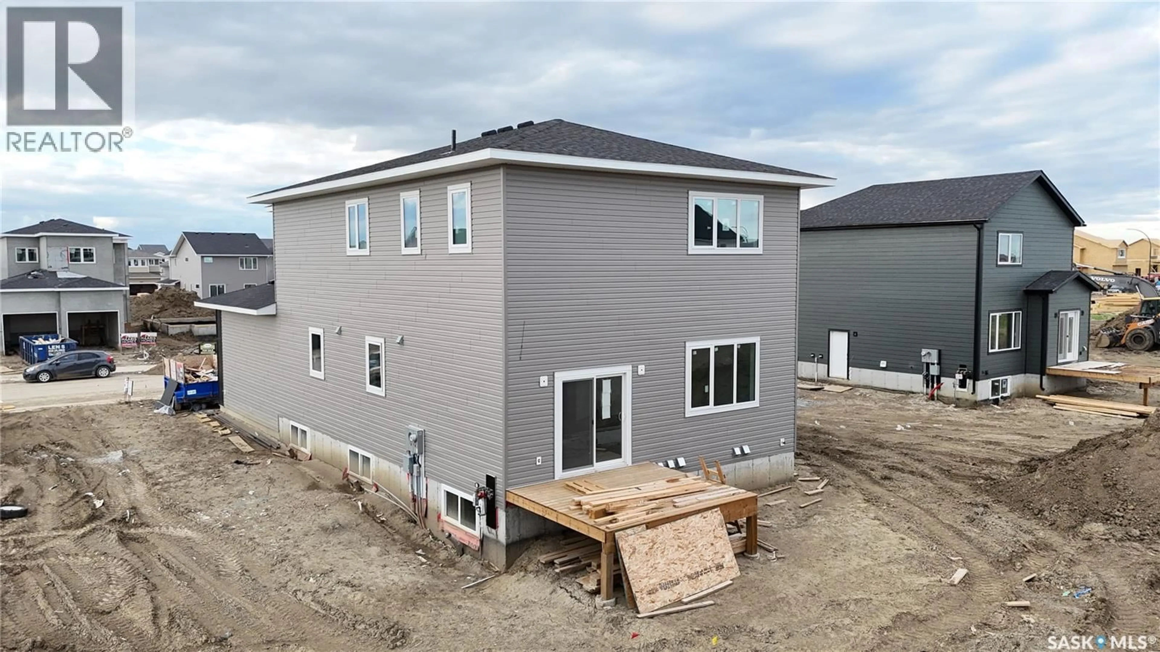 Home with vinyl exterior material, building for 715 NAZARALI LANE, Saskatoon Saskatchewan S7V1X4
