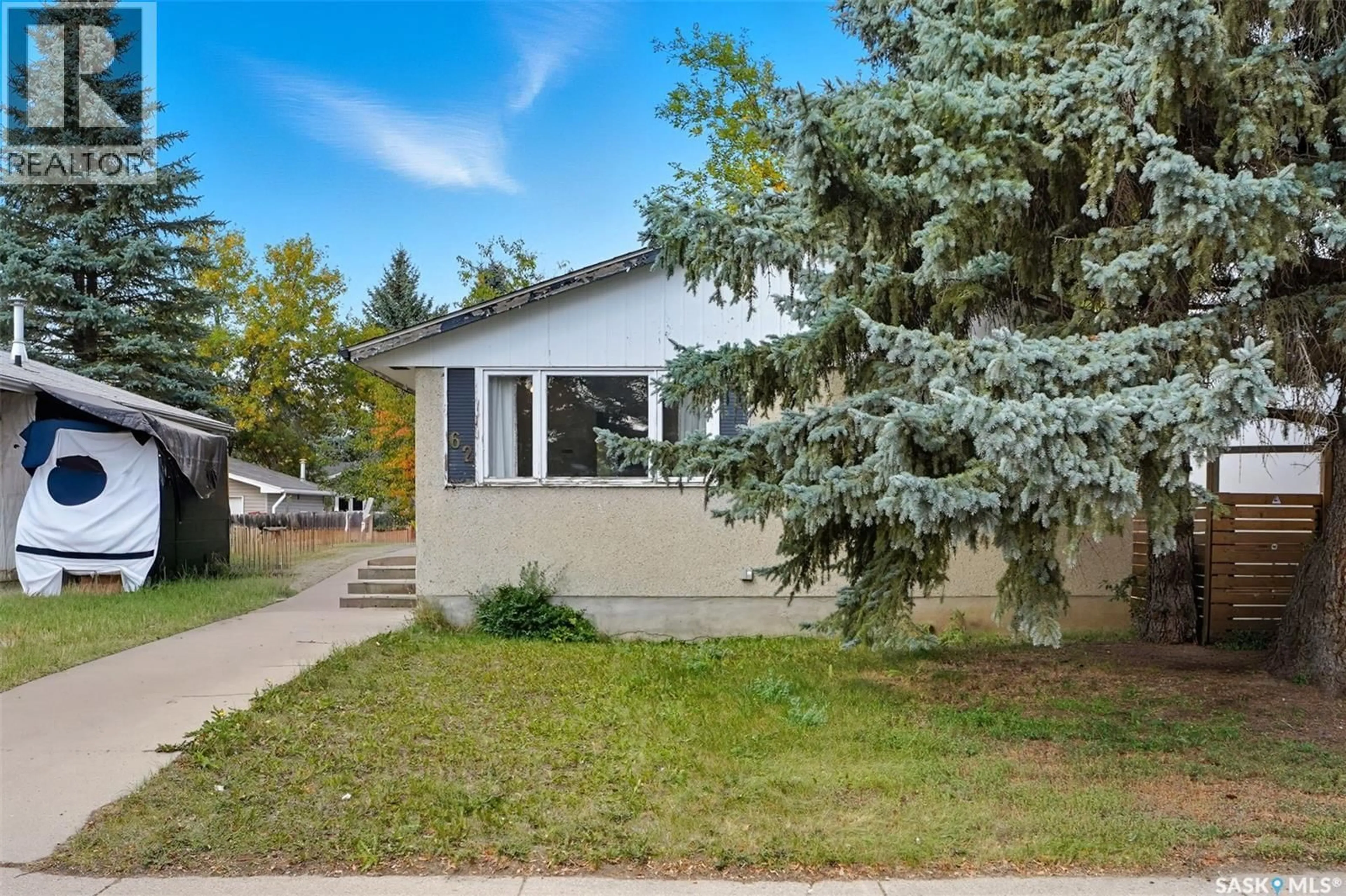 Home with vinyl exterior material, street for 62 DOMINION CRESCENT, Saskatoon Saskatchewan S7L4N7