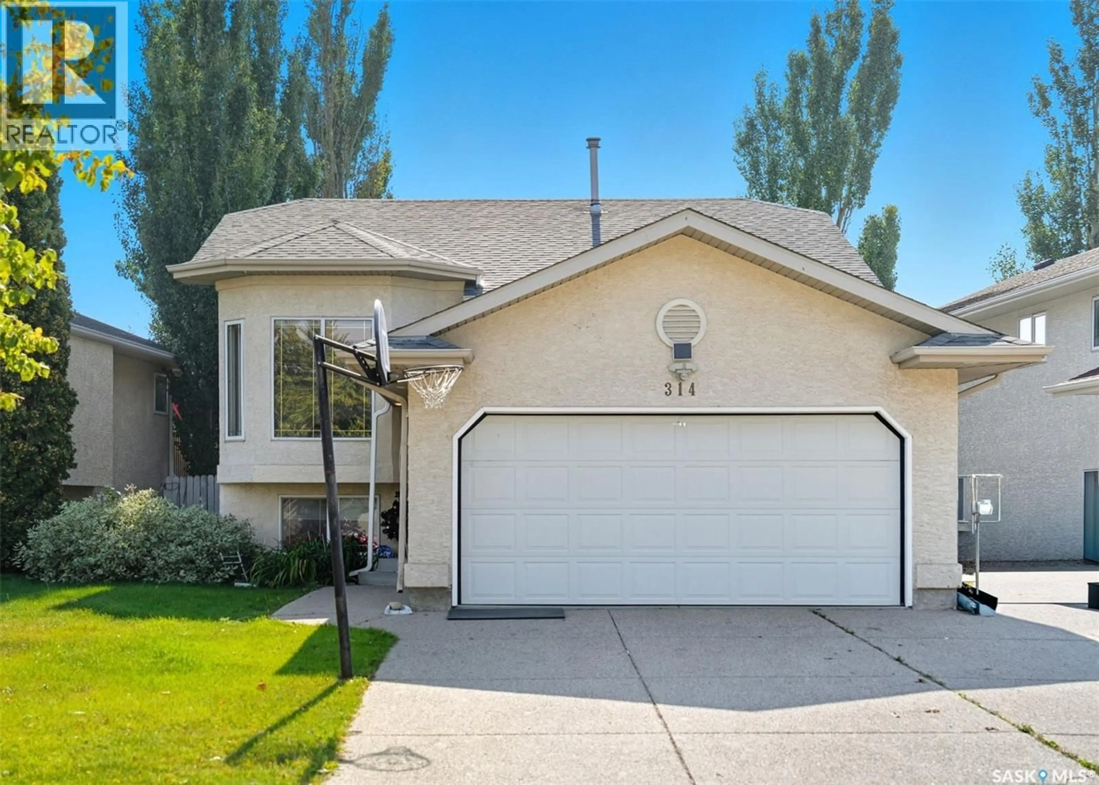 Home with vinyl exterior material, street for 314 BUDZ CRESCENT, Saskatoon Saskatchewan S7N4M5