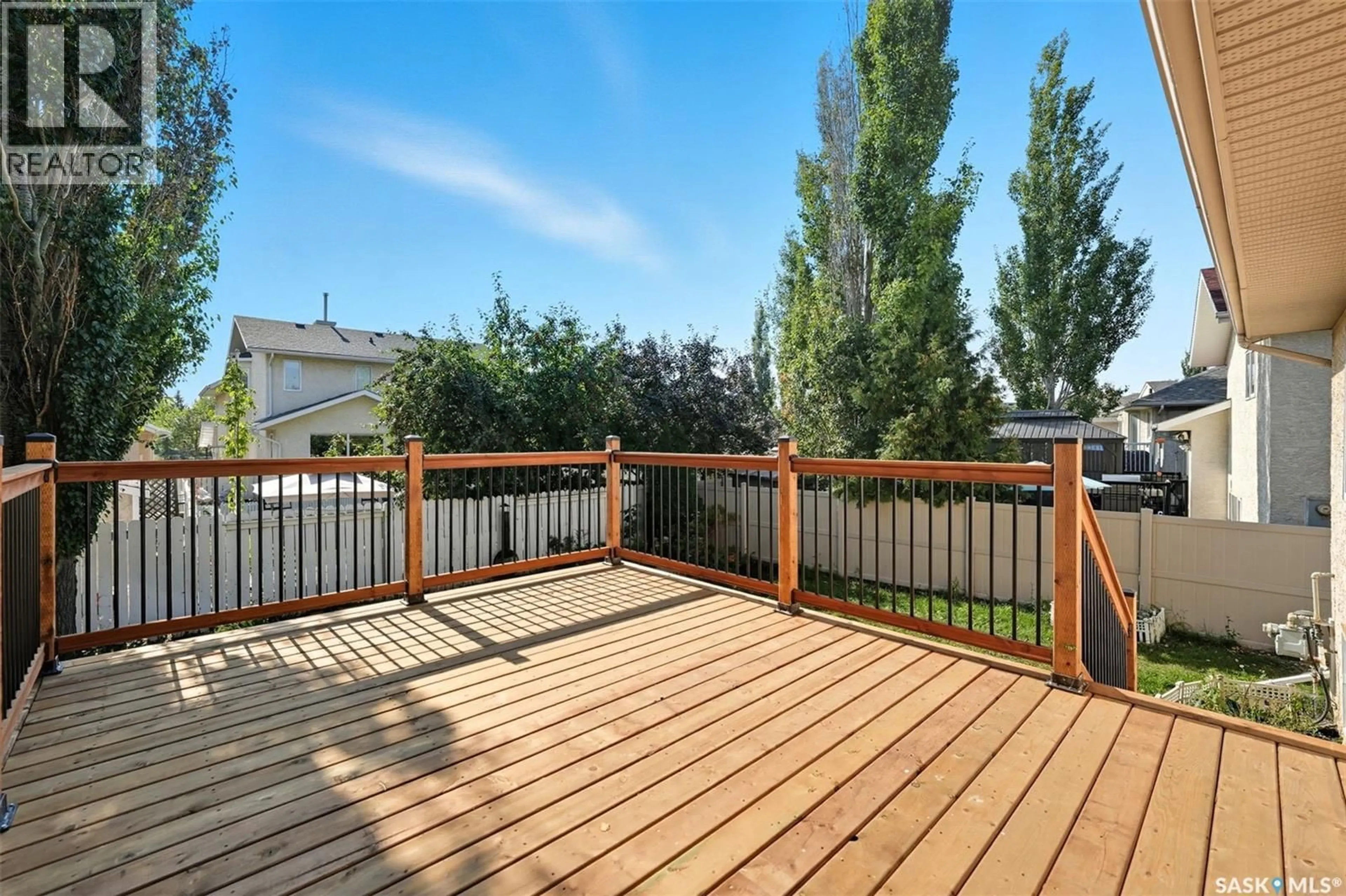 Patio, water/lake/river/ocean view for 314 BUDZ CRESCENT, Saskatoon Saskatchewan S7N4M5