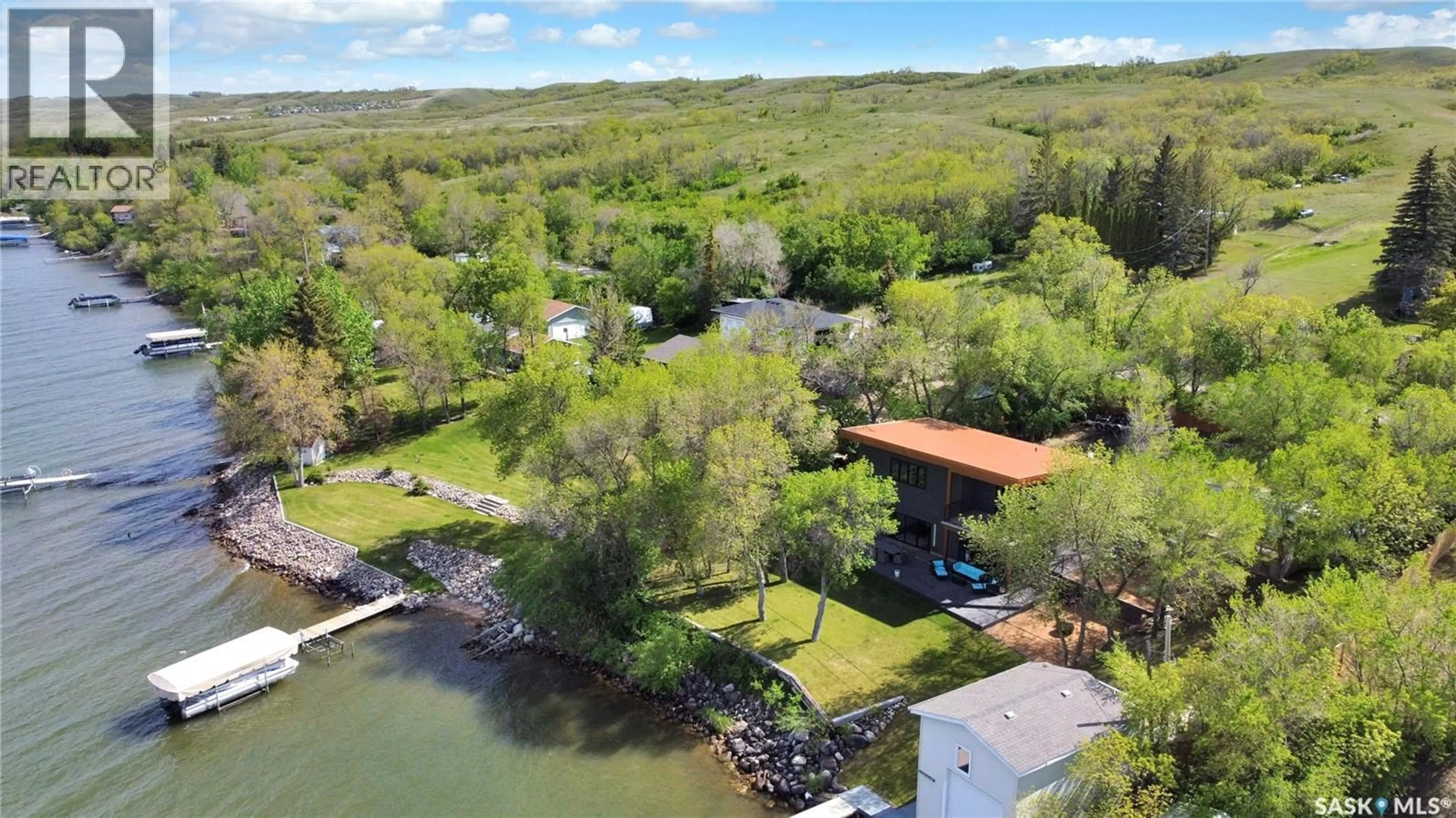 A pic from outside/outdoor area/front of a property/back of a property/a pic from drone, water/lake/river/ocean view for 1202 TATANKA DRIVE, Sun Valley Saskatchewan S0H4C0