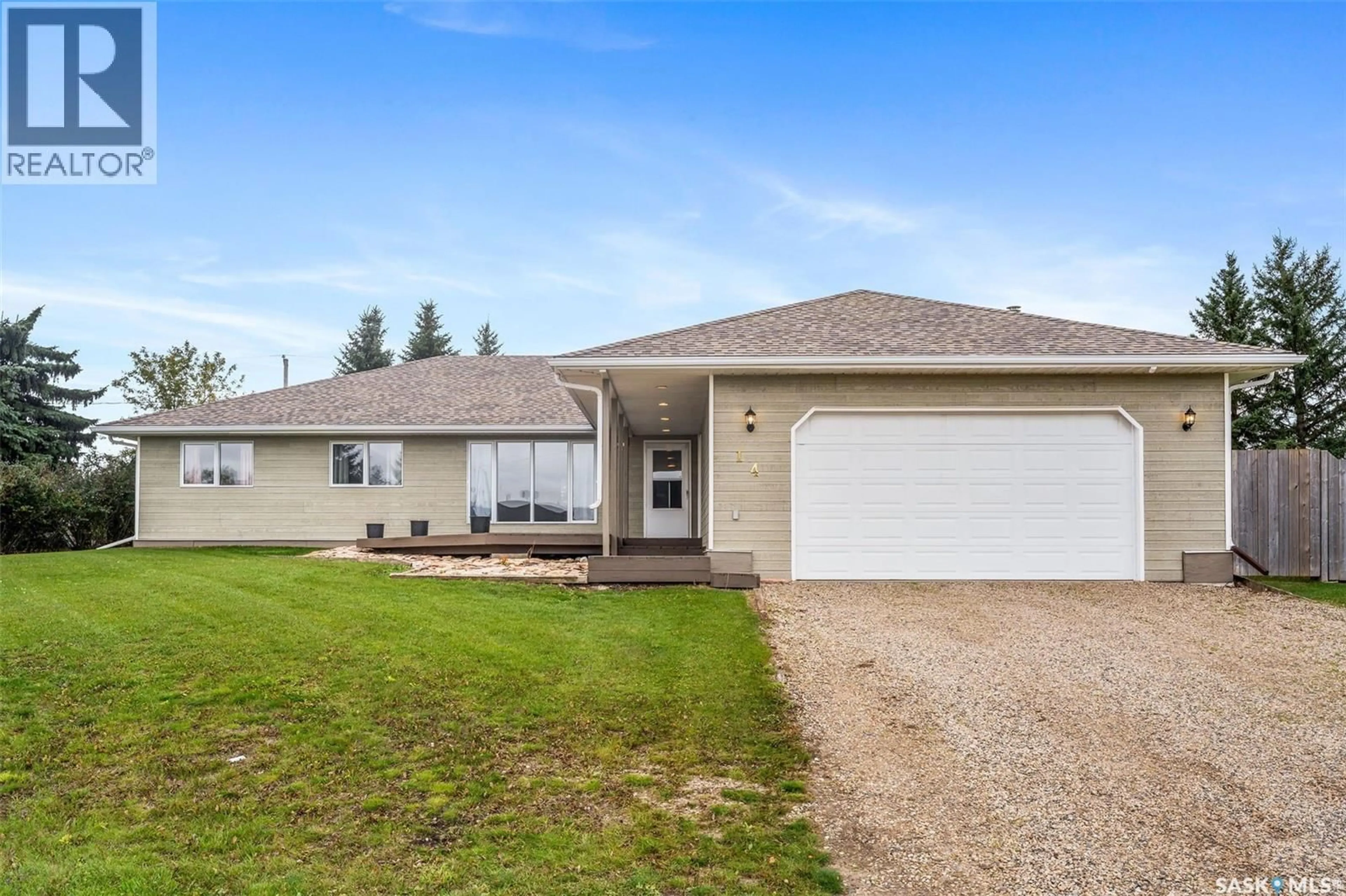 Home with vinyl exterior material, street for 14 POPLAR DRIVE, Birch Hills Saskatchewan S0J0G0