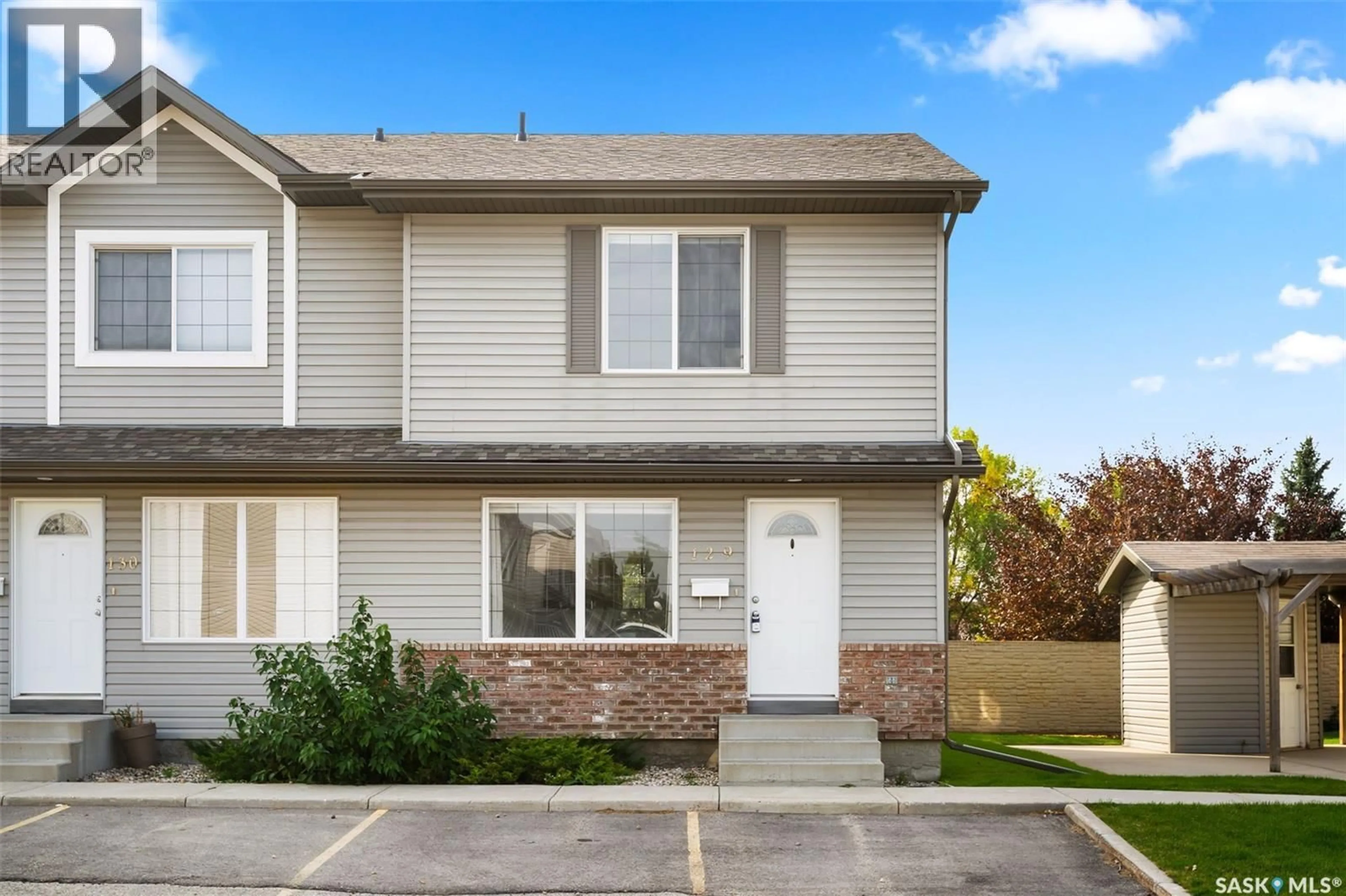 Home with vinyl exterior material, street for 129 4801 CHILD AVENUE, Regina Saskatchewan S4X0C4