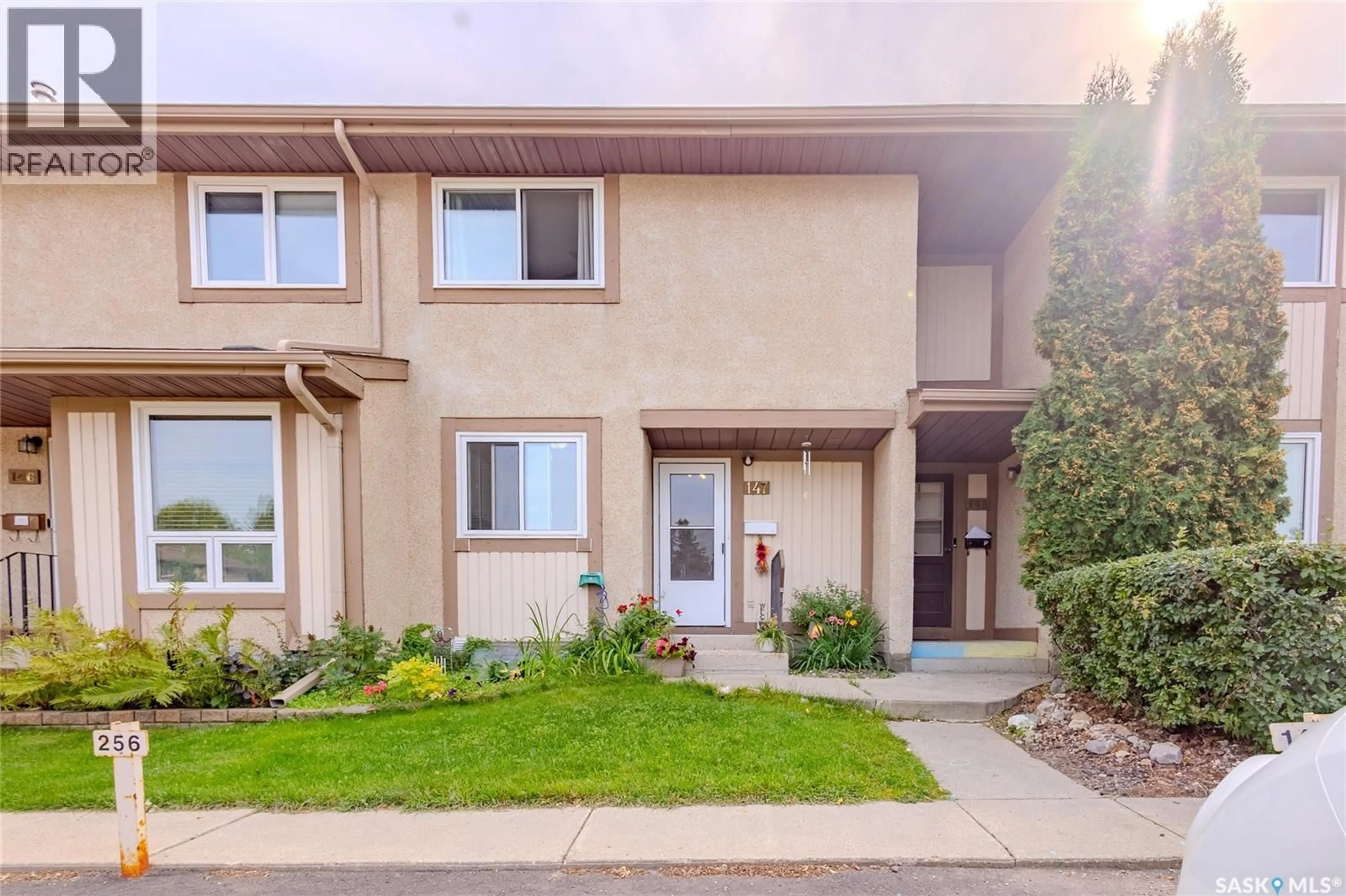 Home with vinyl exterior material, street for 1128 - 147 MCKERCHER DRIVE, Saskatoon Saskatchewan S7H4Y7