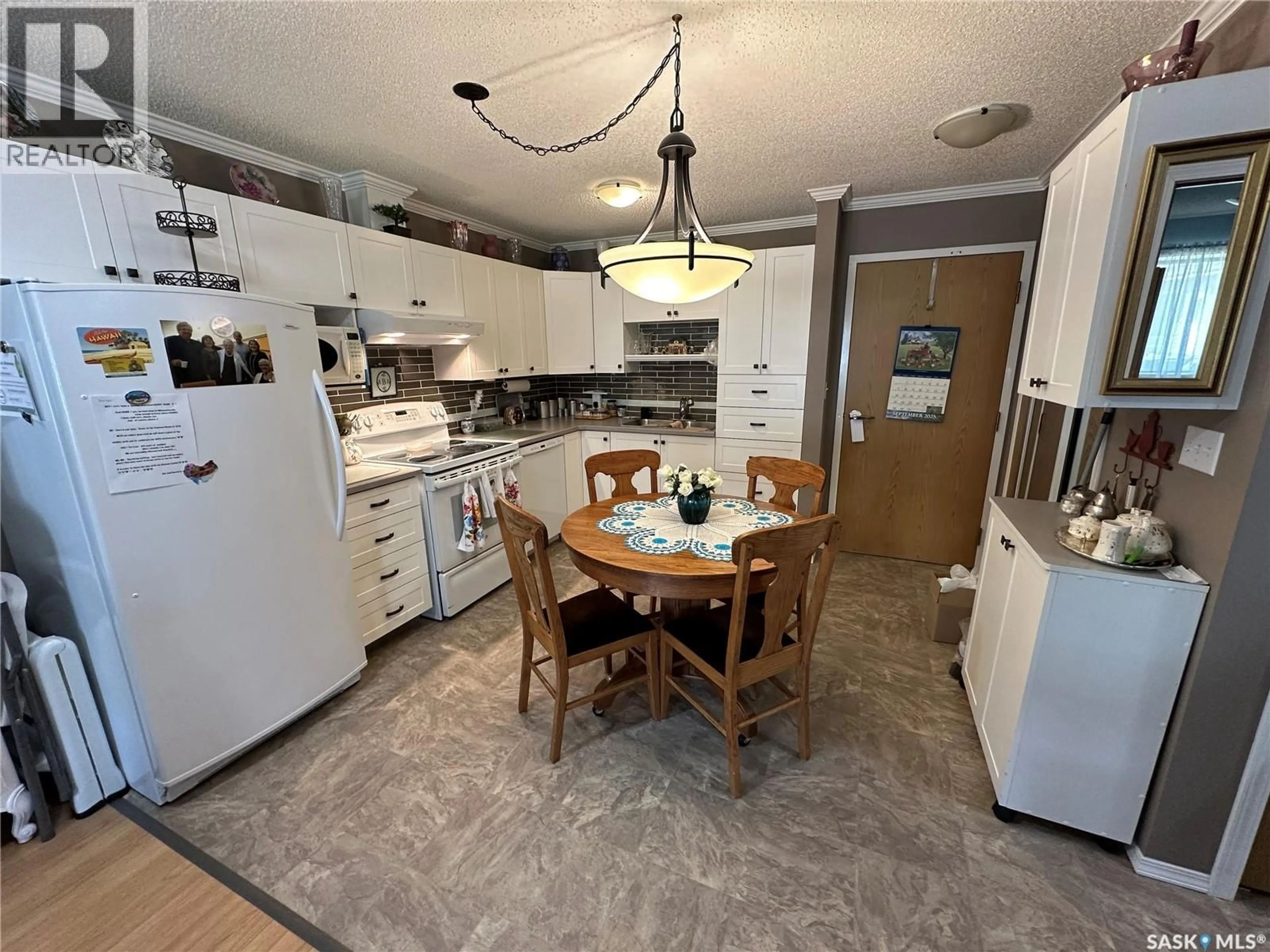 Open concept kitchen, ceramic/tile floor for 7 - 5004 5TH STREET, Rosthern Saskatchewan S0K3R0