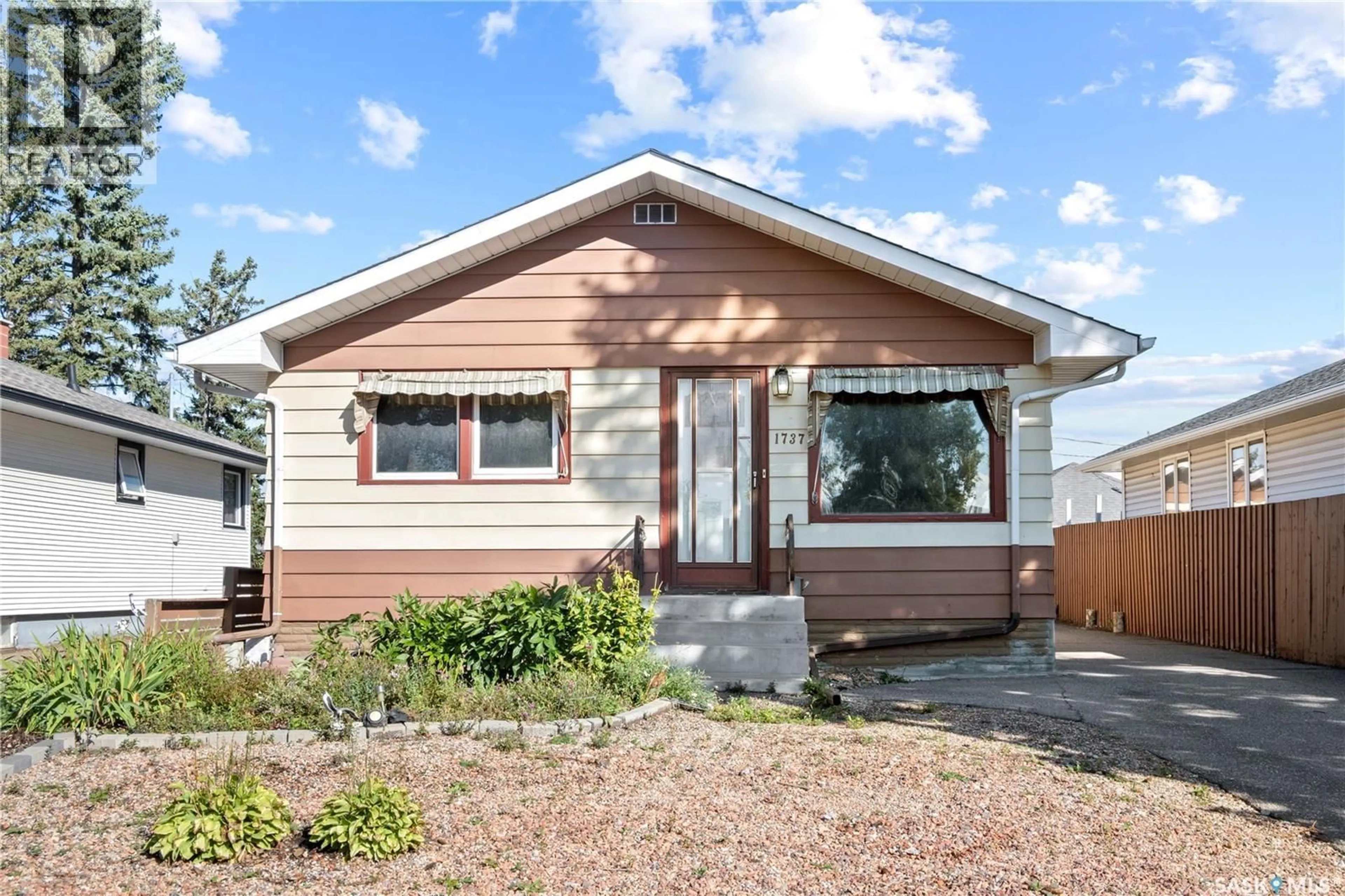 Home with vinyl exterior material, street for 1737 REGENT STREET, Regina Saskatchewan S4N1S4