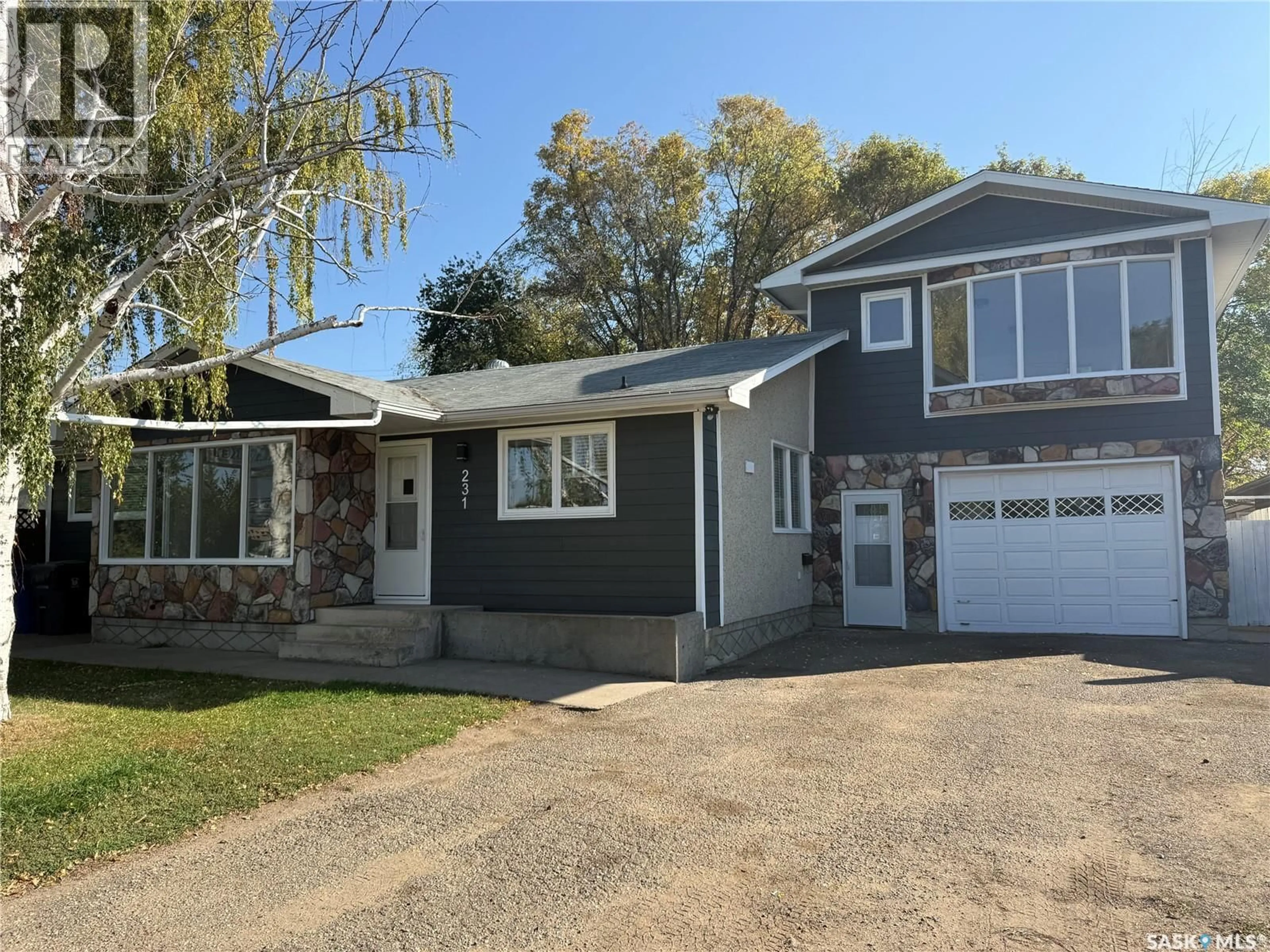 Home with vinyl exterior material, street for 231 29TH STREET, Battleford Saskatchewan S0M1X0