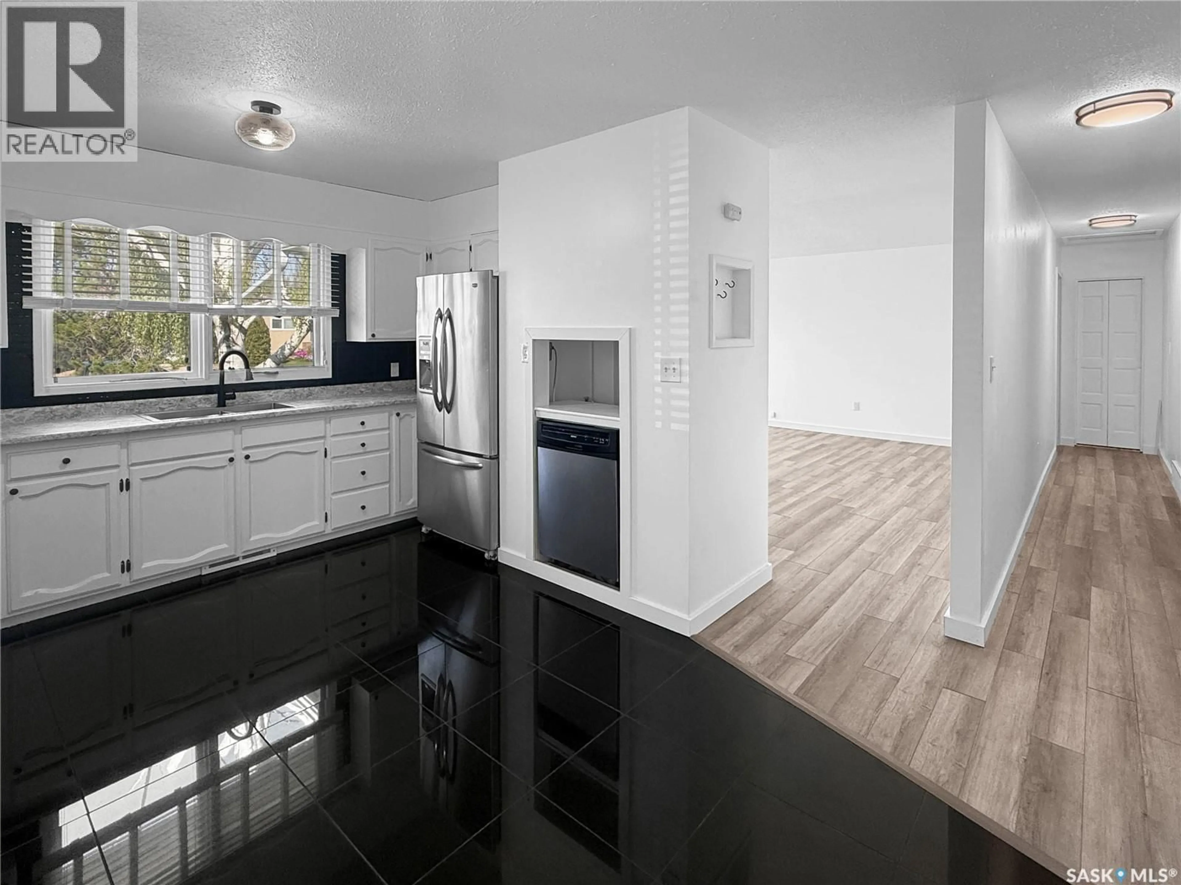 Open concept kitchen, ceramic/tile floor for 231 29TH STREET, Battleford Saskatchewan S0M1X0