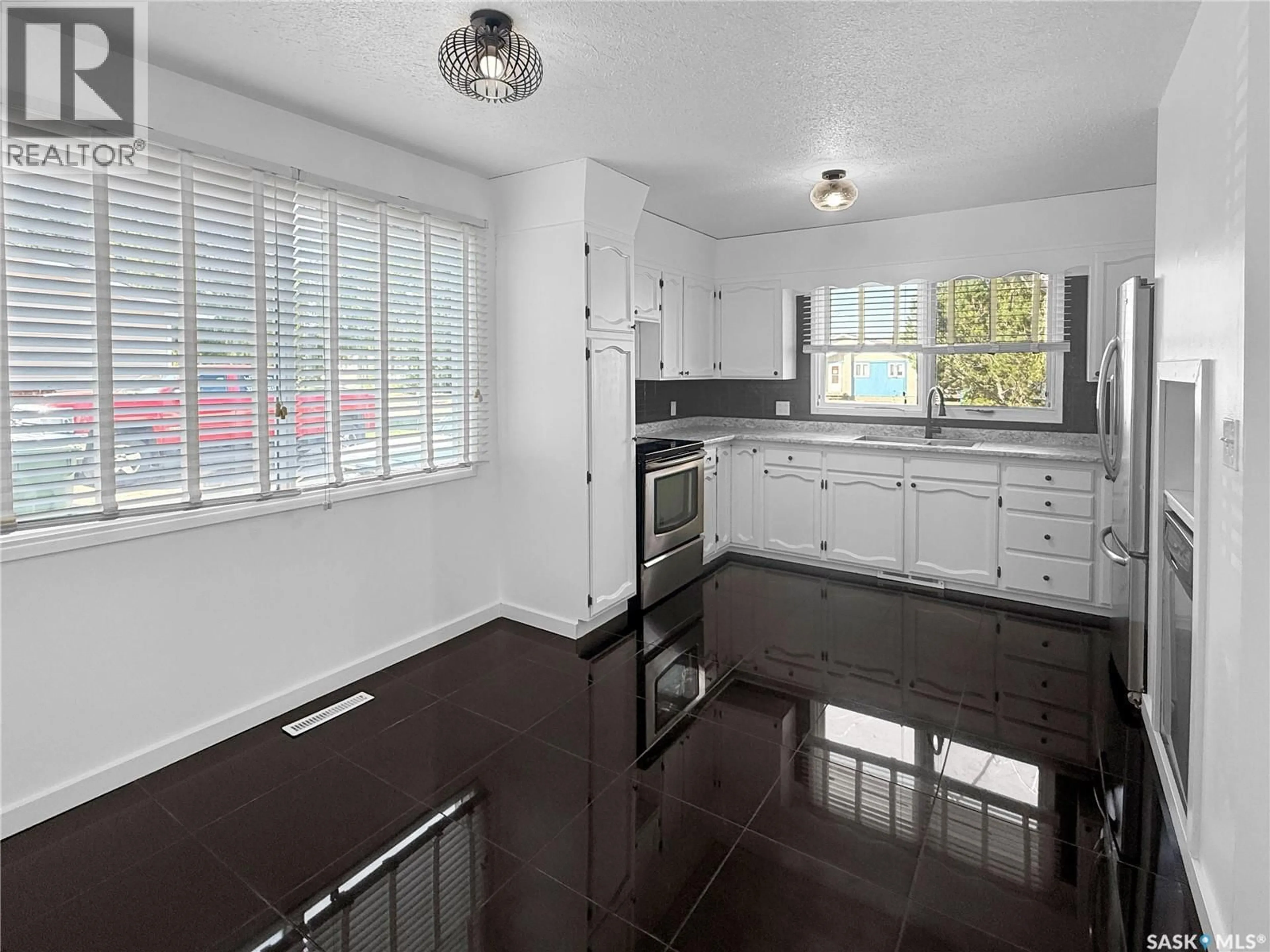 Open concept kitchen, unknown for 231 29TH STREET, Battleford Saskatchewan S0M1X0