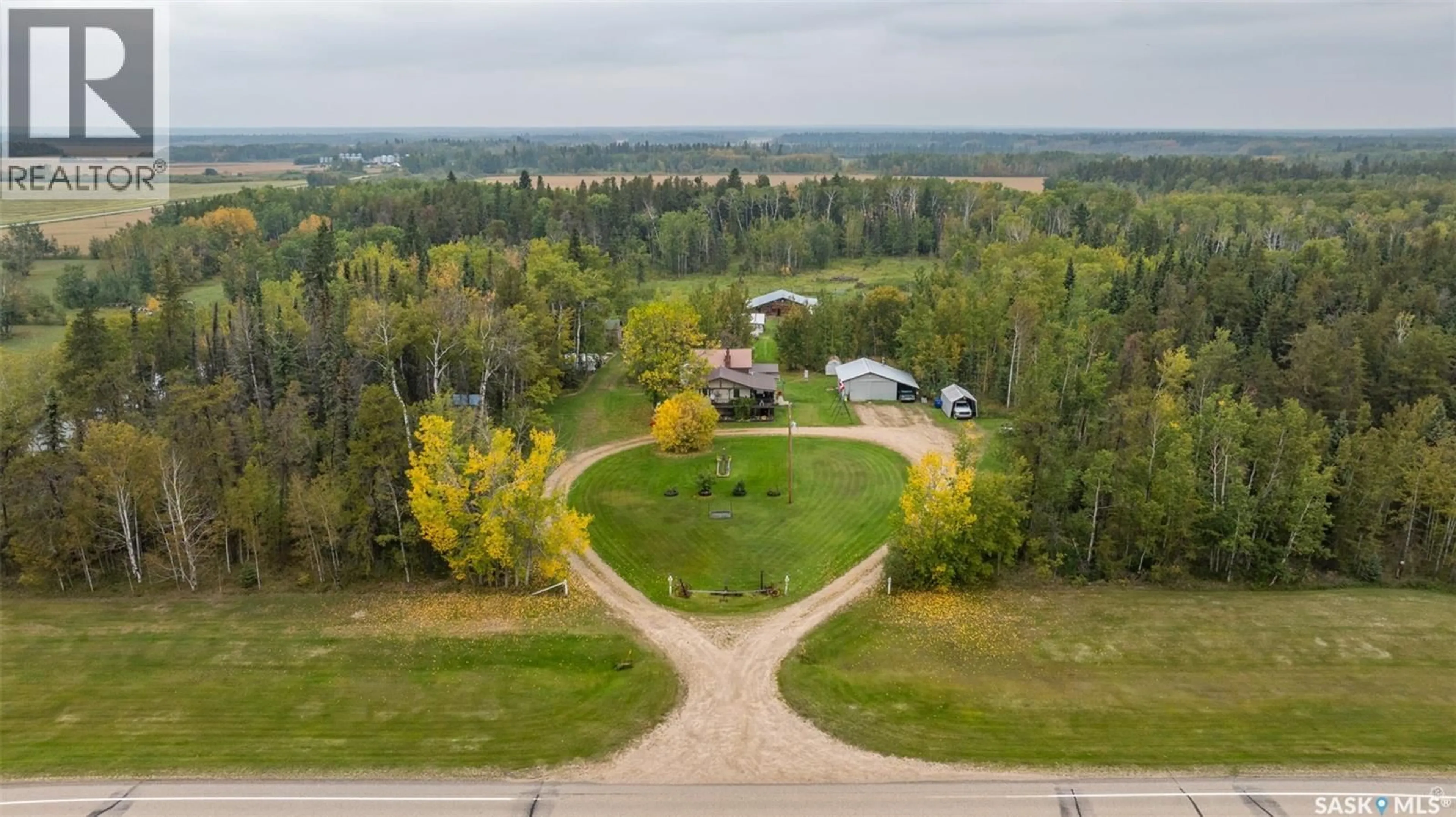 A pic from outside/outdoor area/front of a property/back of a property/a pic from drone, forest/trees view for 55 HIGHWAY, Torch River Rm No. 488 Saskatchewan S0J2N0