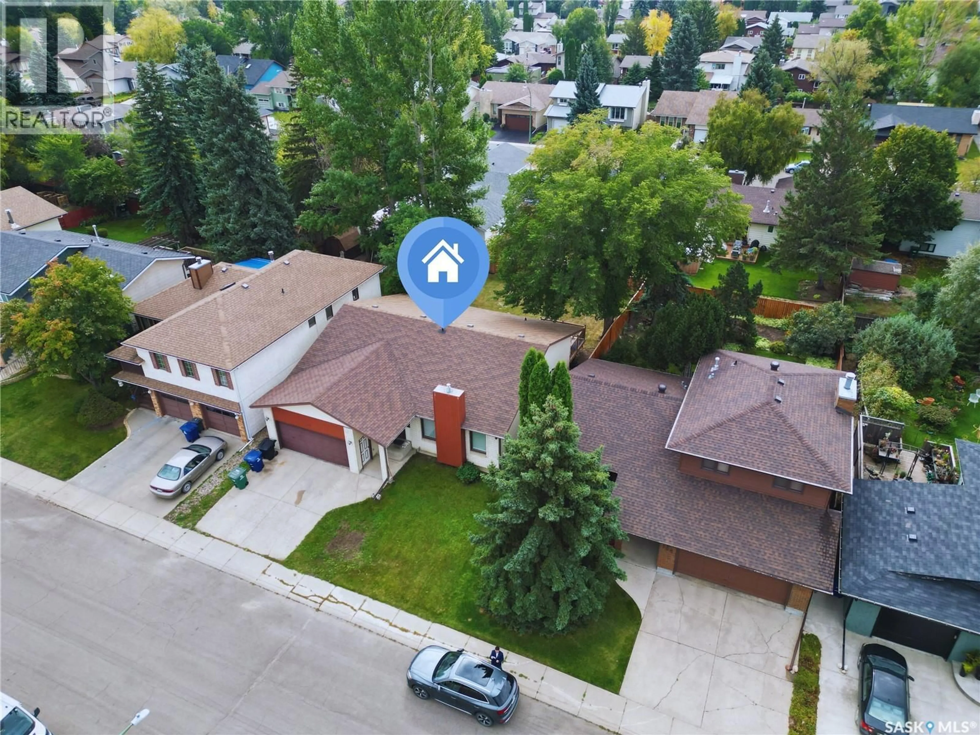 A pic from outside/outdoor area/front of a property/back of a property/a pic from drone, street for 150 CREAN CRESCENT, Saskatoon Saskatchewan S7J3W8