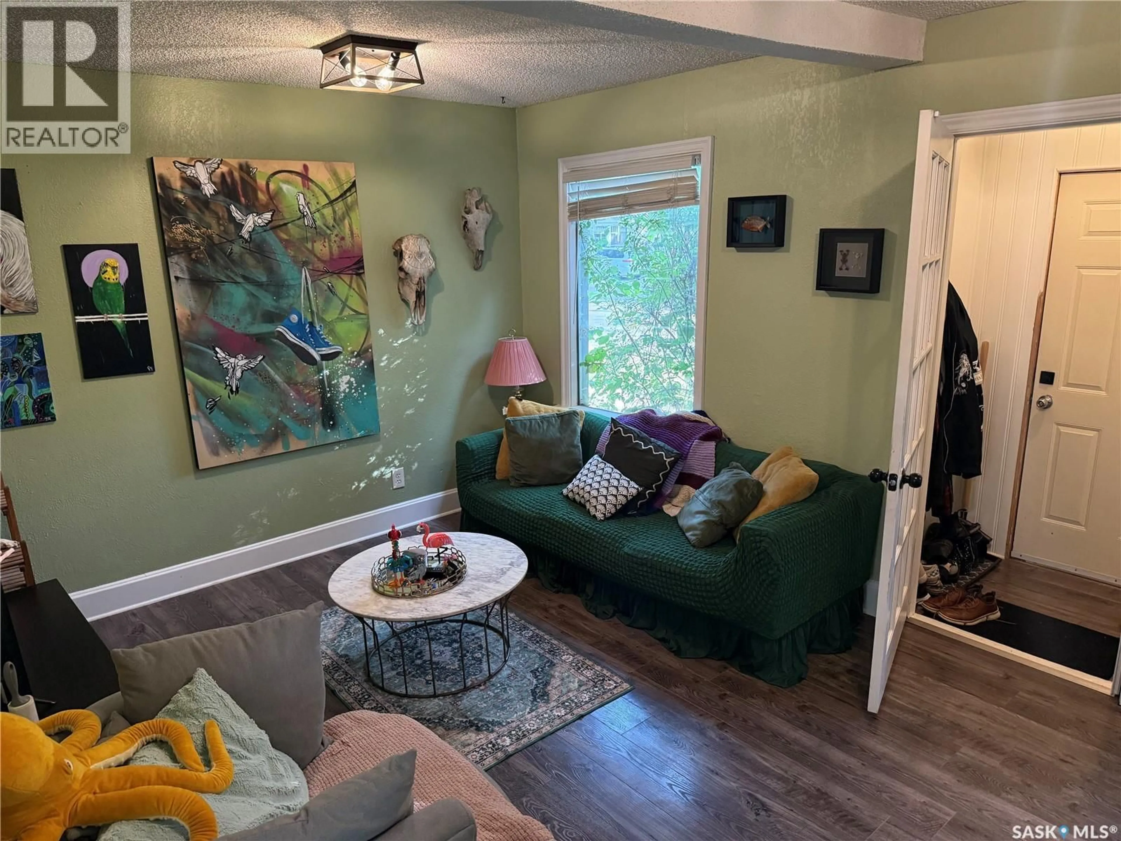 Living room with furniture, unknown for 615 C AVENUE, Saskatoon Saskatchewan S7L1J6