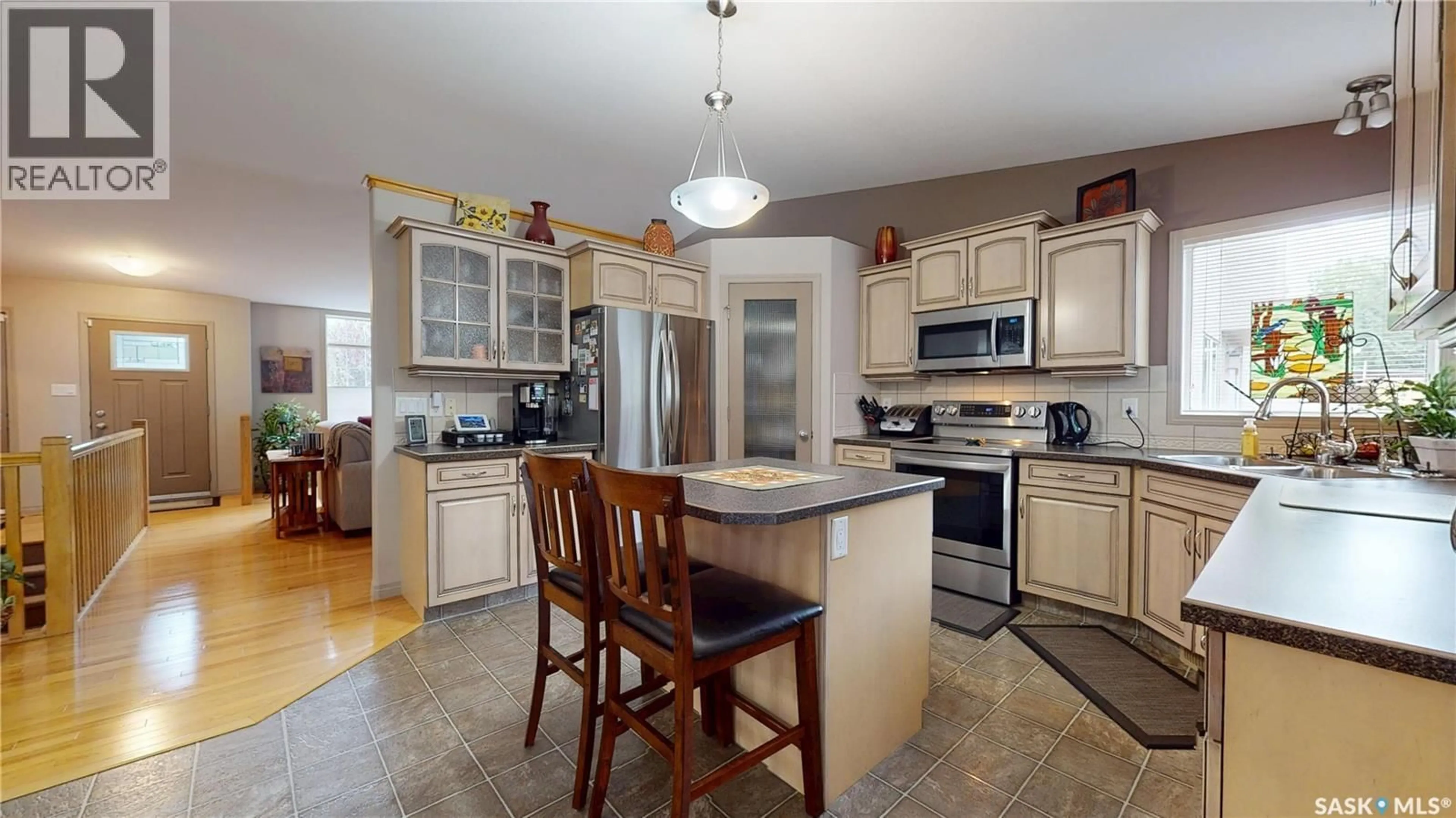 Open concept kitchen, ceramic/tile floor for 3610 CUMBERLAND ROAD, Regina Saskatchewan S4V3C4