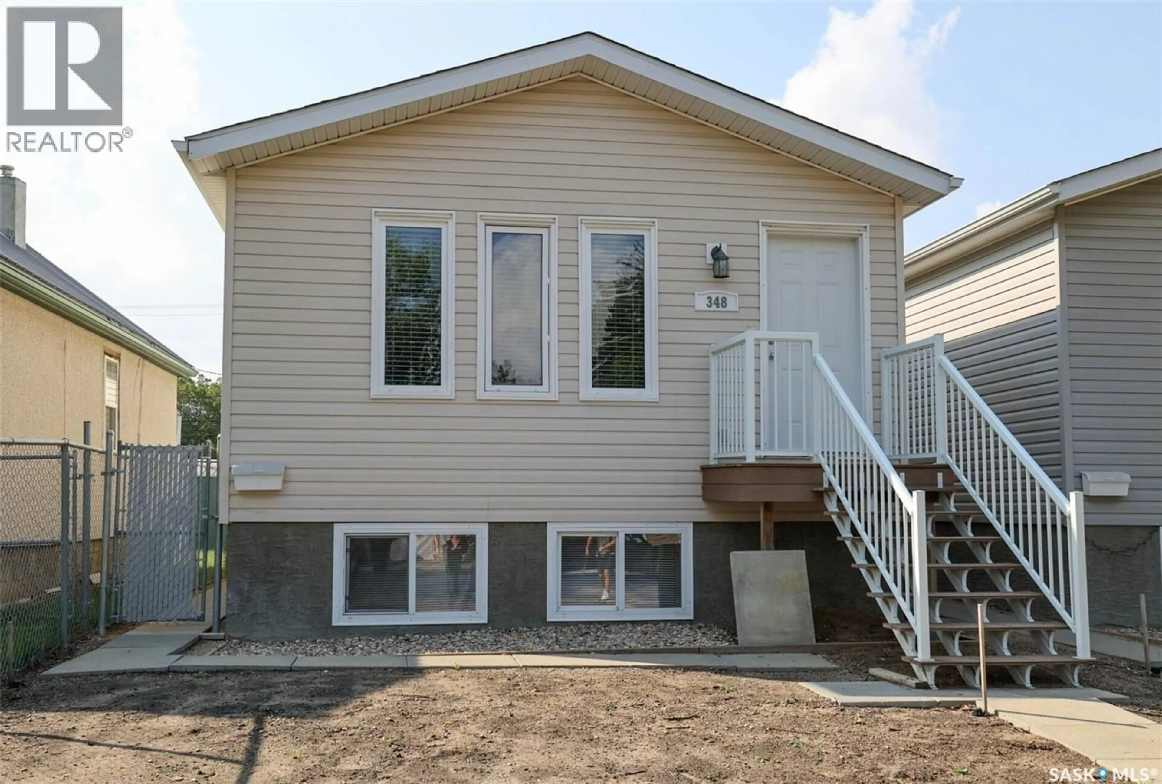 Home with vinyl exterior material, building for 348 ROBINSON STREET, Regina Saskatchewan S4R3R2