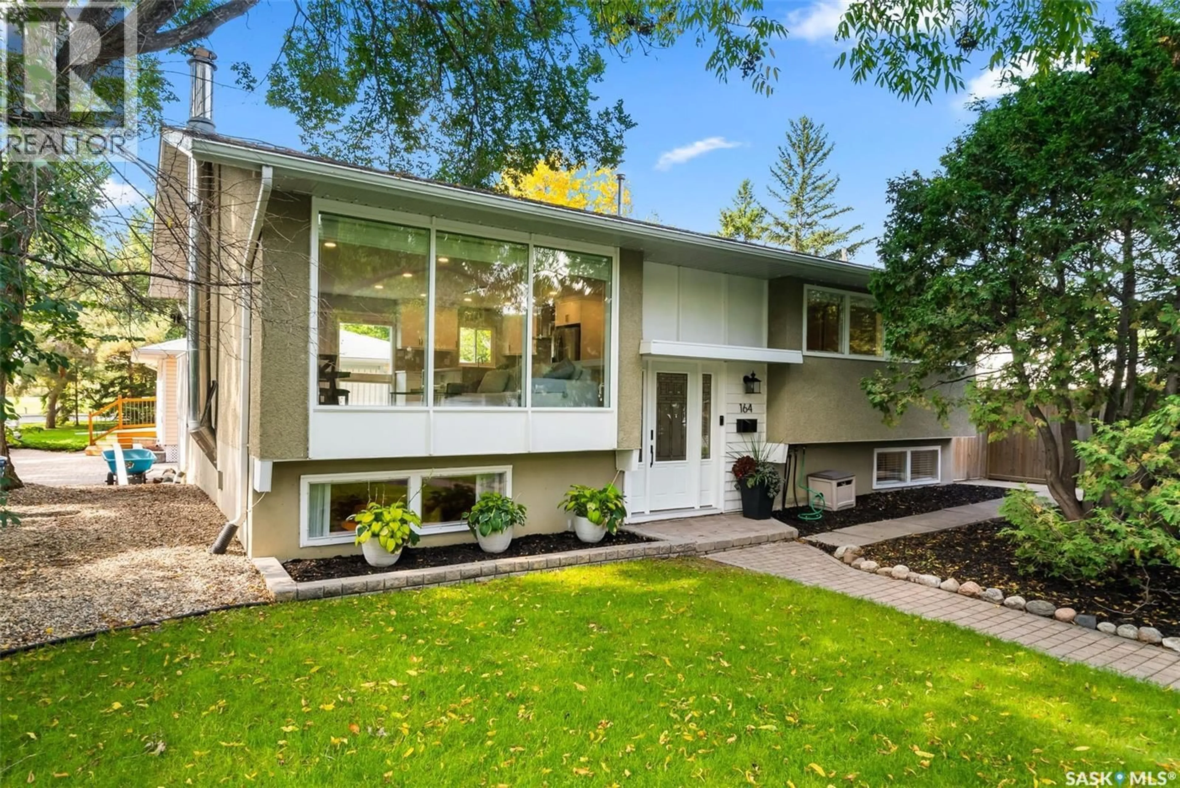 Home with vinyl exterior material, street for 164 SHANNON ROAD, Regina Saskatchewan S4S5H6