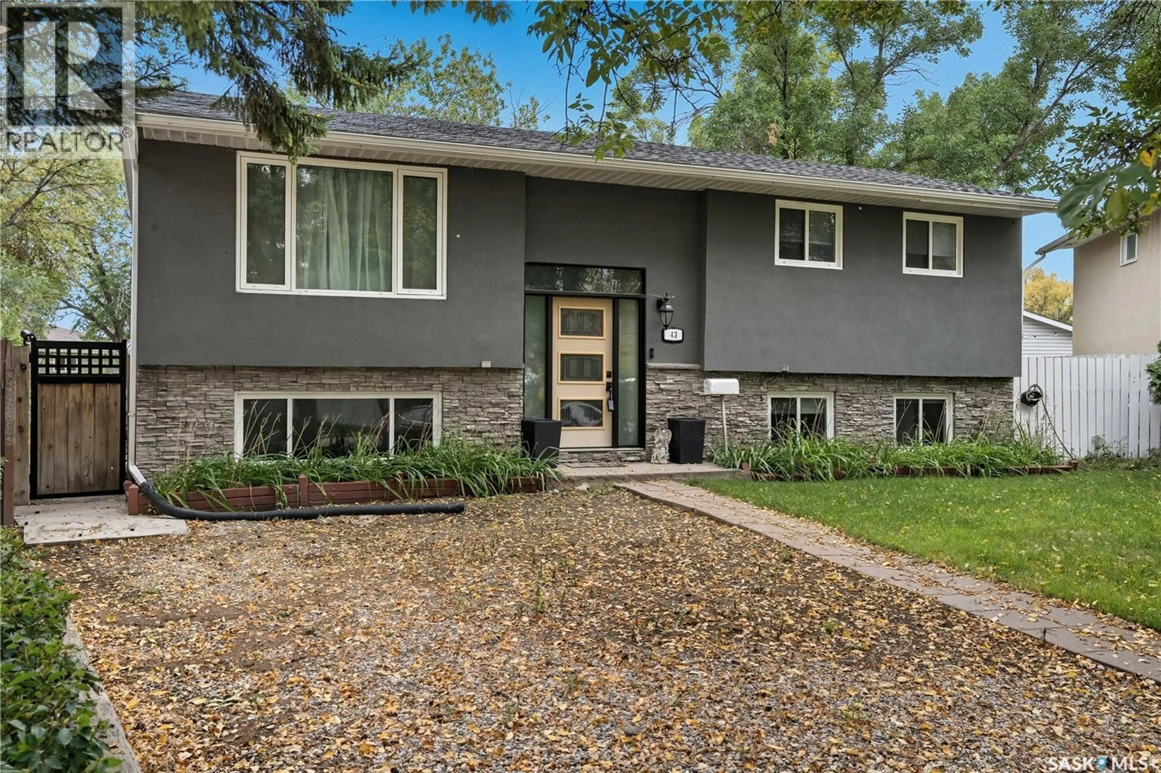 Home with vinyl exterior material, street for 43 WOODSWORTH CRESCENT, Regina Saskatchewan S4T7A9