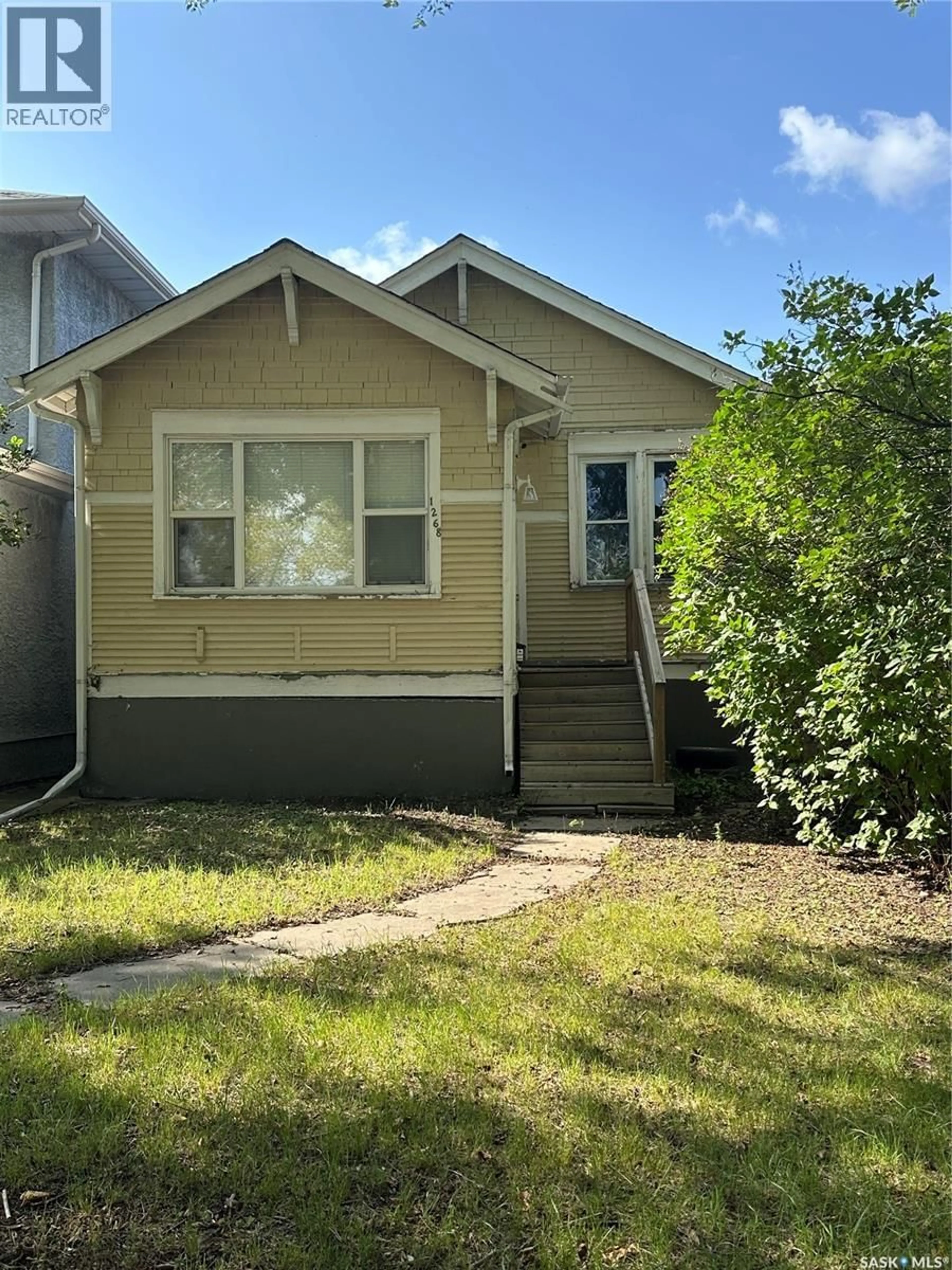 Home with vinyl exterior material, street for 1268 ROBINSON STREET, Regina Saskatchewan S4T2N2
