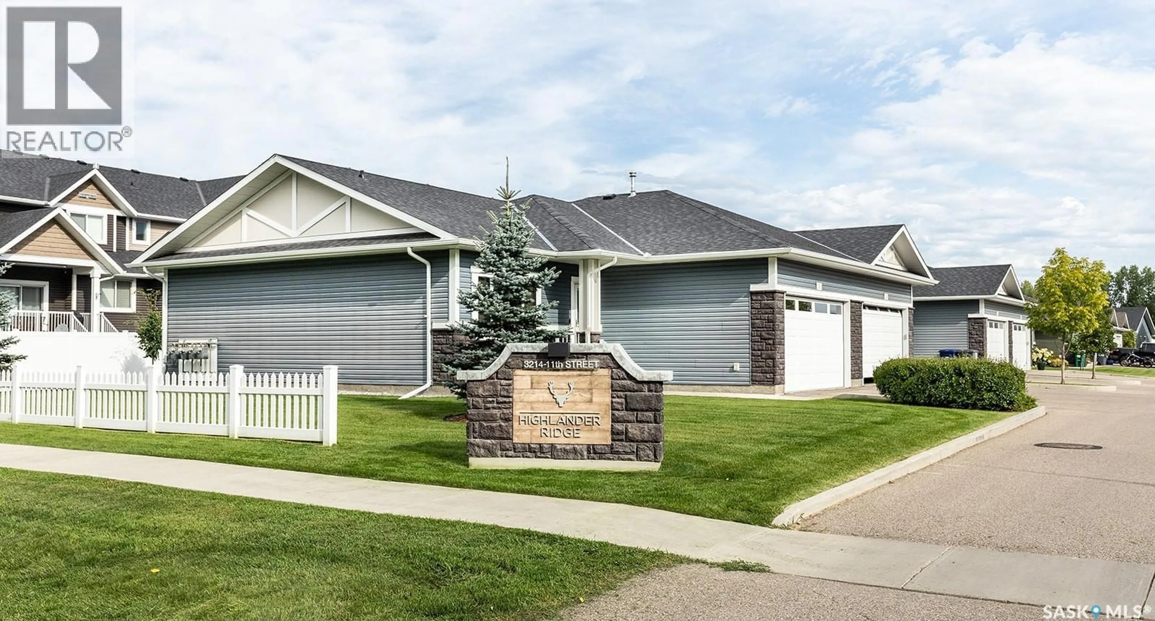 Home with vinyl exterior material, street for 2 - 3214 11TH STREET, Saskatoon Saskatchewan S7M5G3